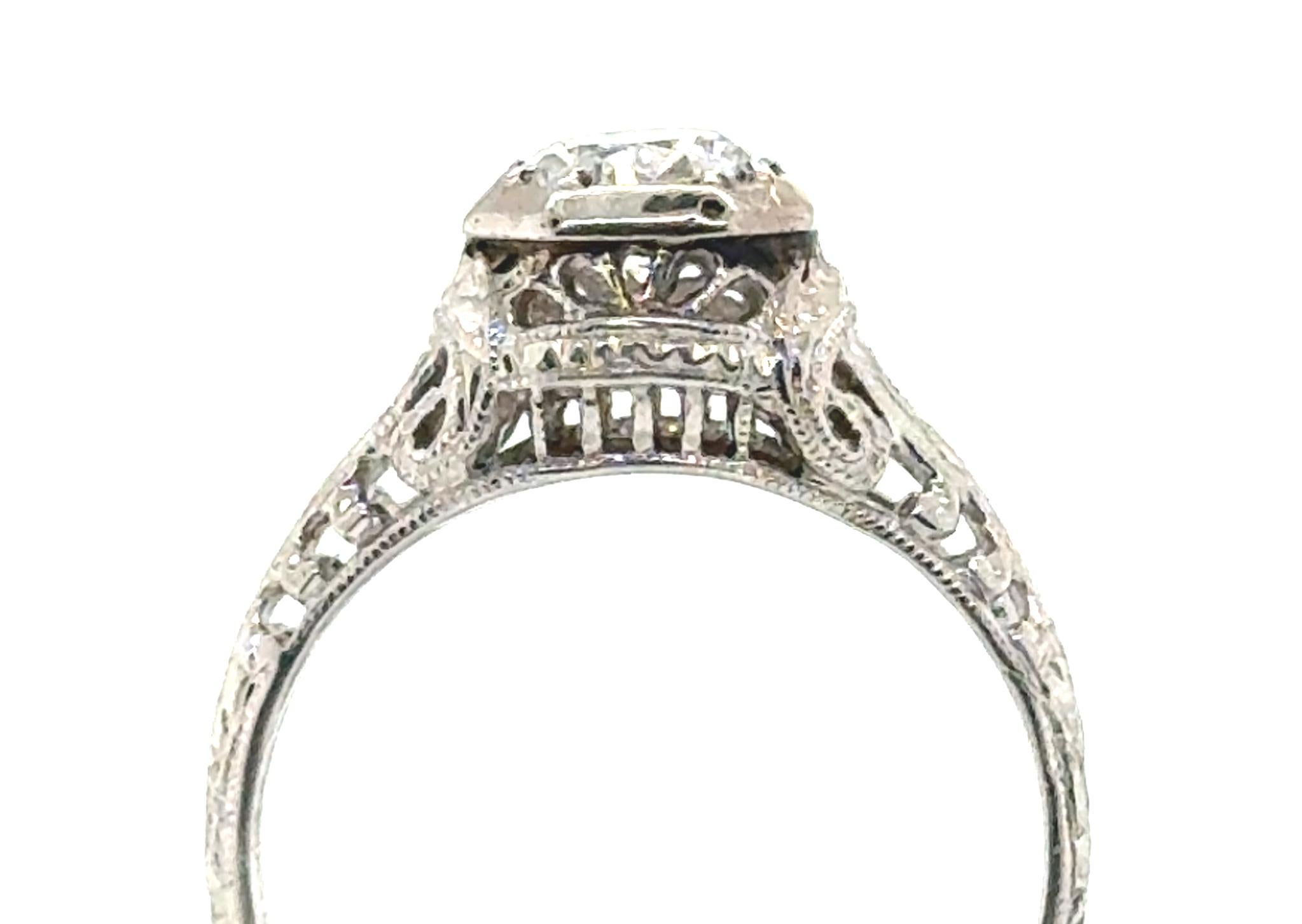 Genuine Original Antique Art Deco from 1930s Vintage .45ct Diamond Platinum Solitaire Art Deco Engagement Ring



Featuring a Spectacular .45ct I/SI1 Genuine Transitional Cut Natural Diamond Center

Absolutely Jaw-Dropping Hand Carved Art Deco