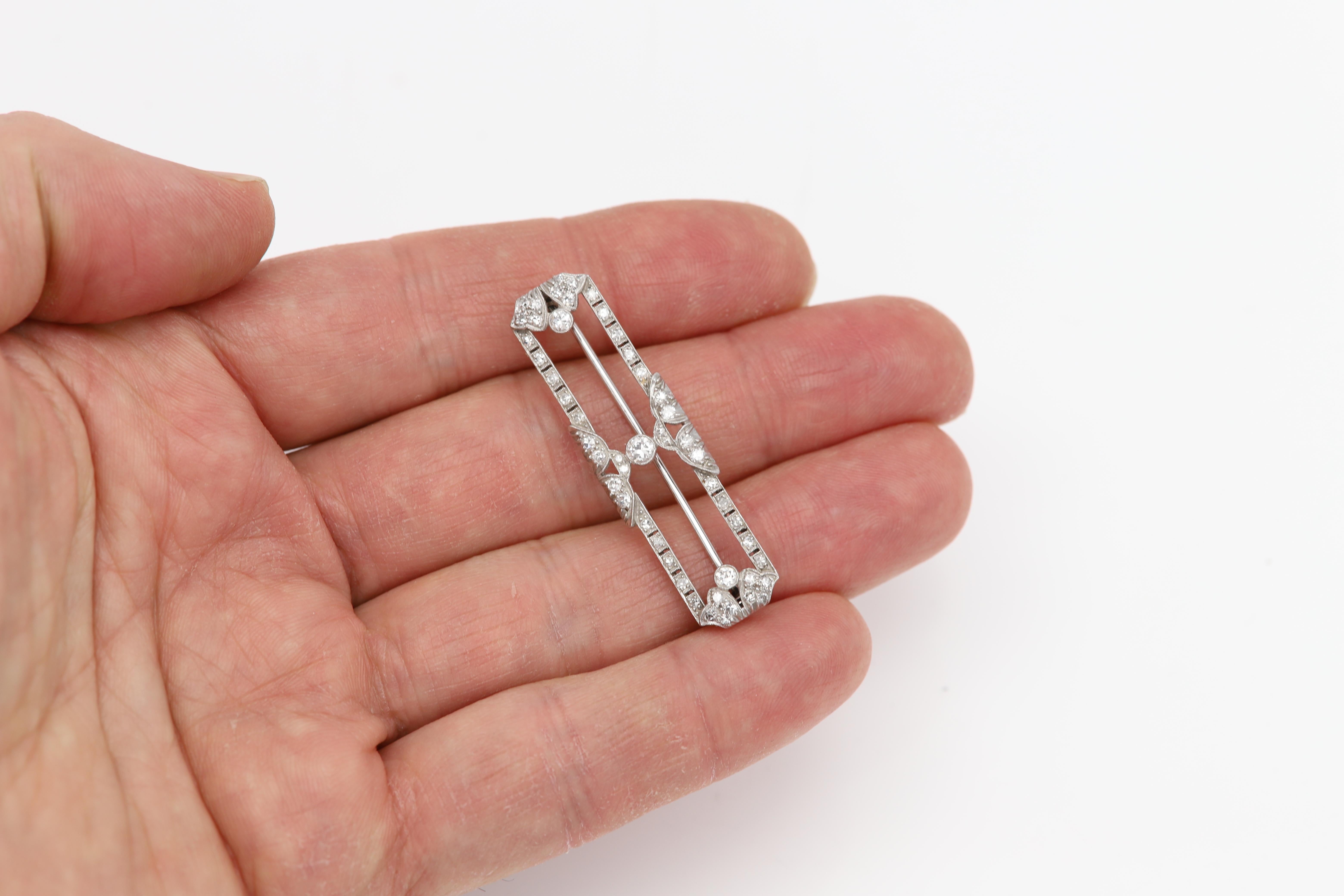 Women's Vintage Diamond Filigree Brooch 18 karat White Gold Brooch Pin circa 1930's For Sale