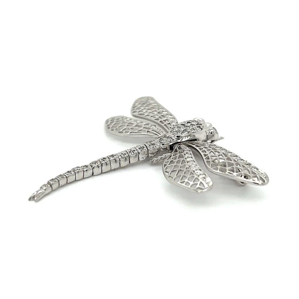 Simply Beautiful! Diamond Dragonfly with Articulating Tail Gold Brooch. Encrusted with Hand set Diamonds, weighing approx. 0.92tcw. Hand crafted in 18 Karat White Gold. This pin is in excellent vintage condition and recently professionally cleaned