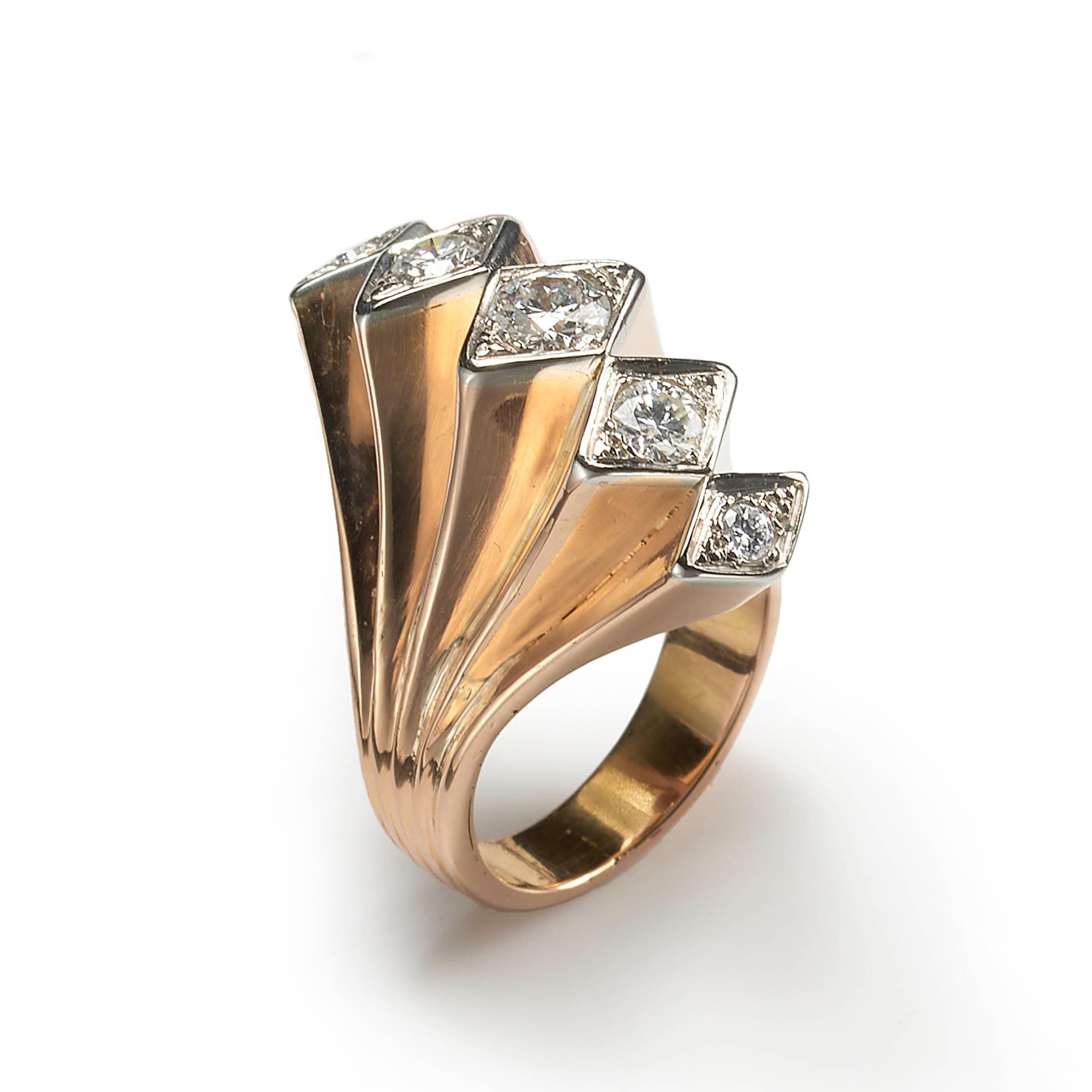 A vintage, diamond and gold five row fan ring, with five, graduating, round brilliant-cut diamonds, in the centre of each row, in white gold rhombus shaped grain settings, with concertina fan shaped shoulders, mounted in 18ct gold, circa 1940, with