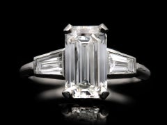 Vintage Diamond Flanked Solitaire Ring, circa 1950