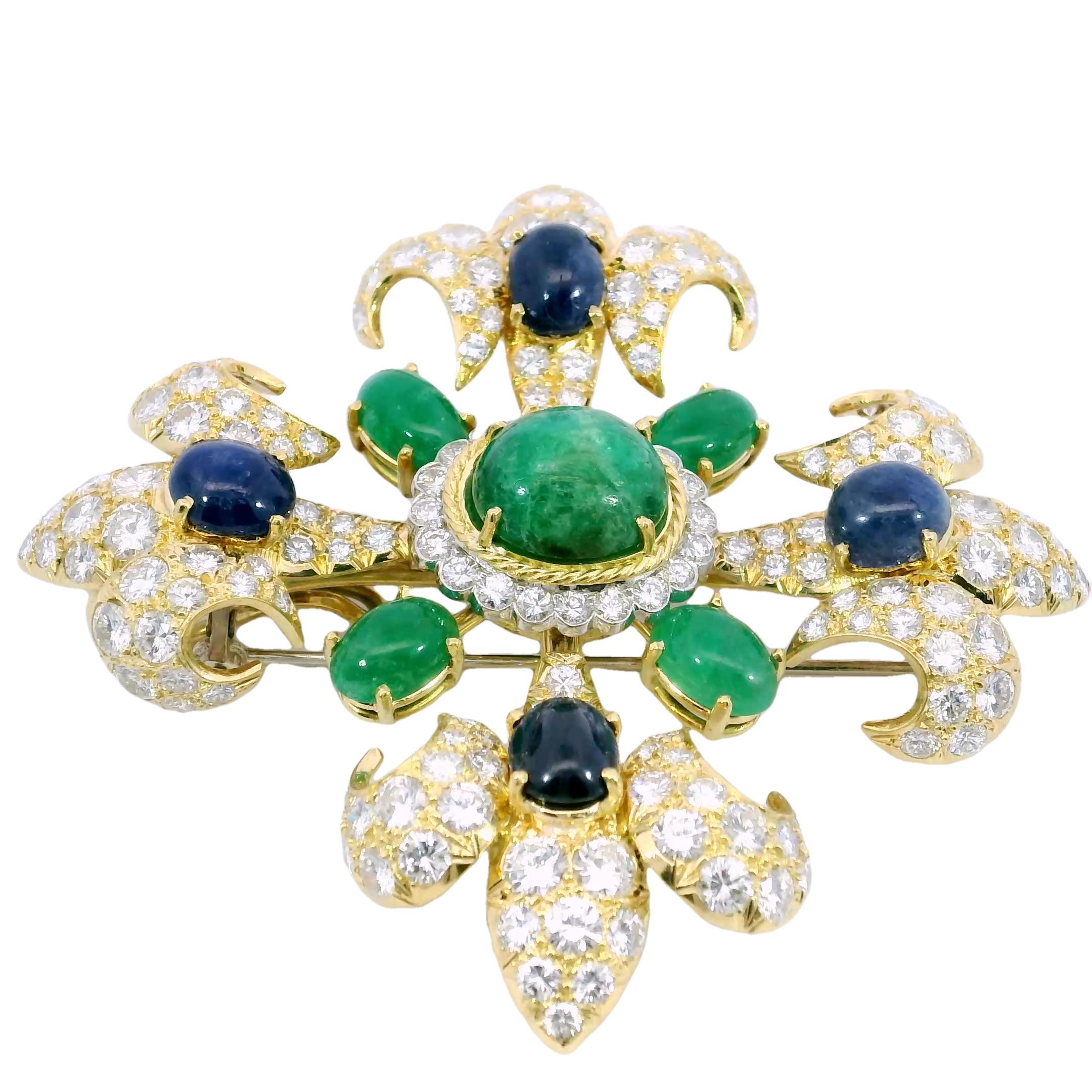Vintage Diamond Fleur de Lis Pendant Brooch 18K Emeralds and Sapphires ~26.62ctw

This remarkable Fleur de Lis brooch is a true statement of artistry and elegance. At its center sits a cabochon-cut emerald, its rich green hue providing a bold focal