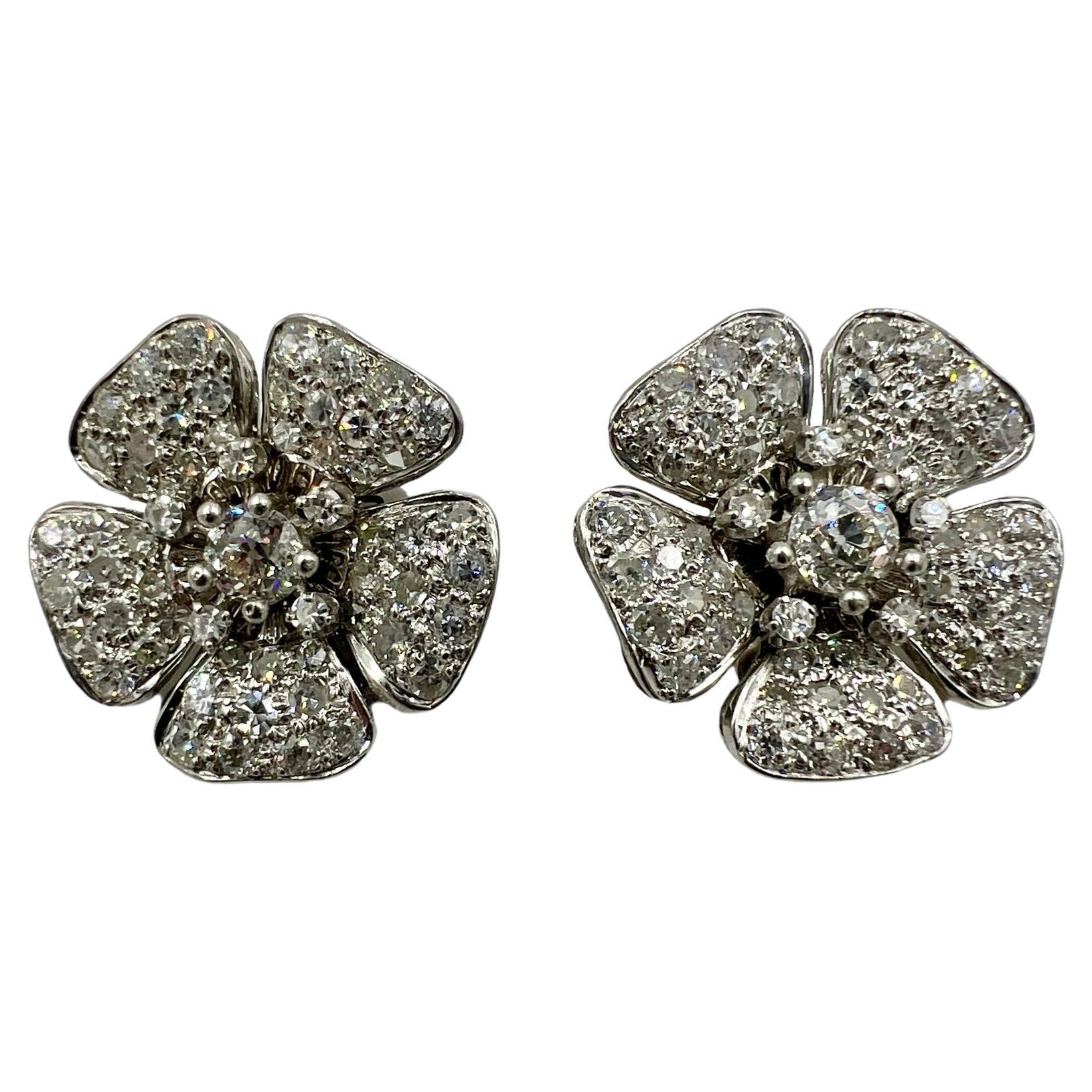 Boucles d'oreilles vintage en platine avec fleur et diamant