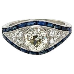 Bague cocktail vintage en platine avec diamant GIA et saphir bleu