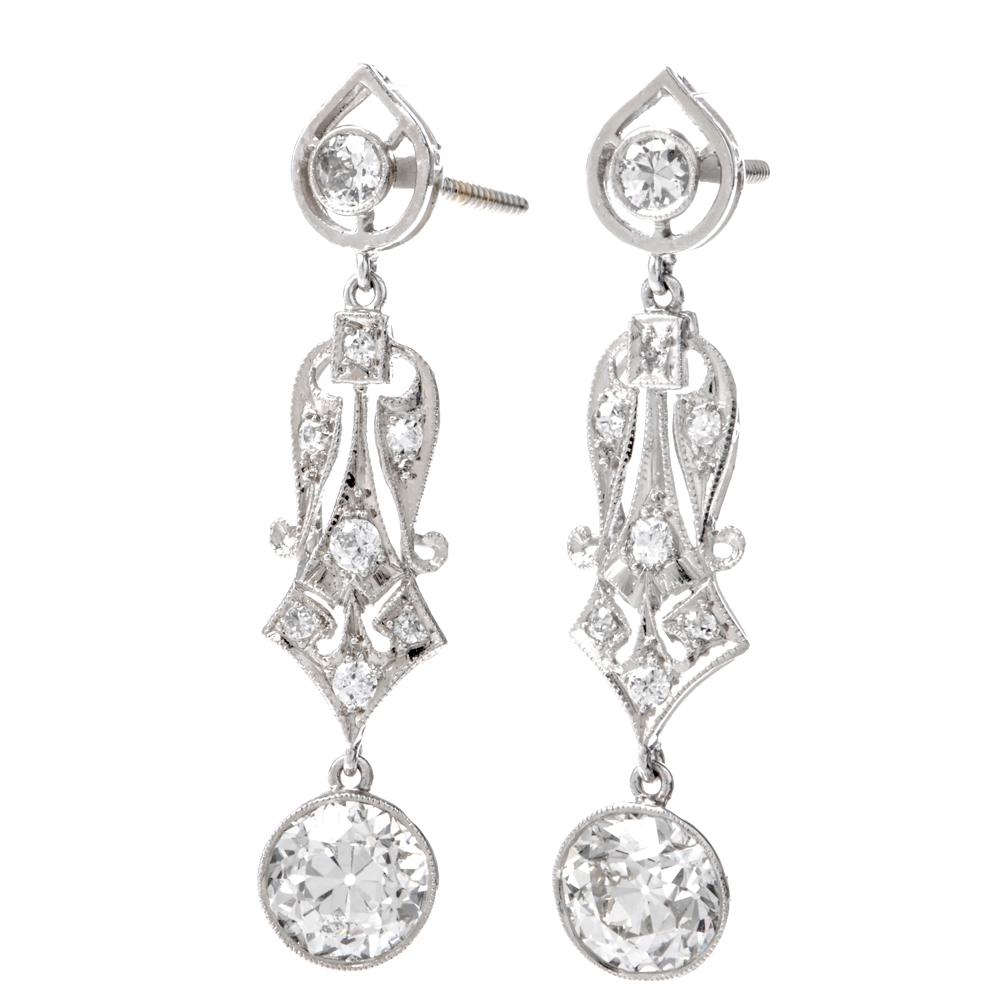 These enchanting diamond pendant earrings of unmatched refinement and feminine grace are handcrafted in 18 karat white gold, weigh 5.5 grams and measure 36 mm long. The earrings incorporate a pair of sizable old-European-cut diamonds weighing