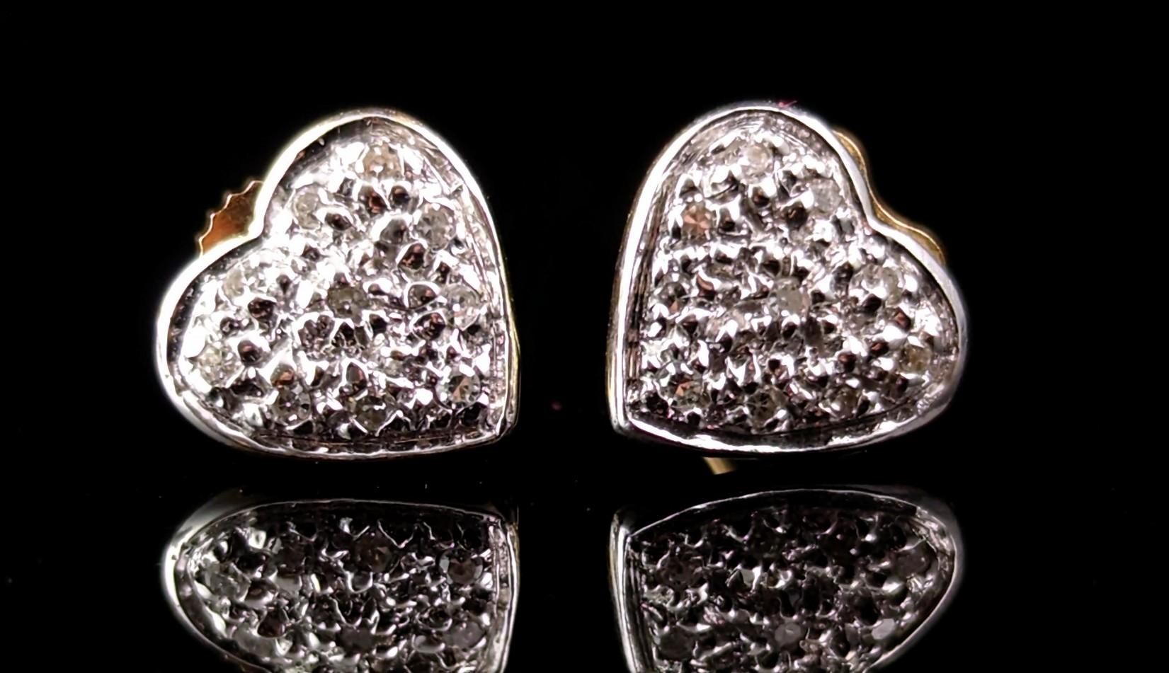 A stunning pair of vintage brilliant cut diamond heart stud earrings.

A classic and timeless jewellery staple these classy diamond studs have a sweet twist with the heart shape, the diamonds are set into 9ct white gold enhancing the cut, brilliance