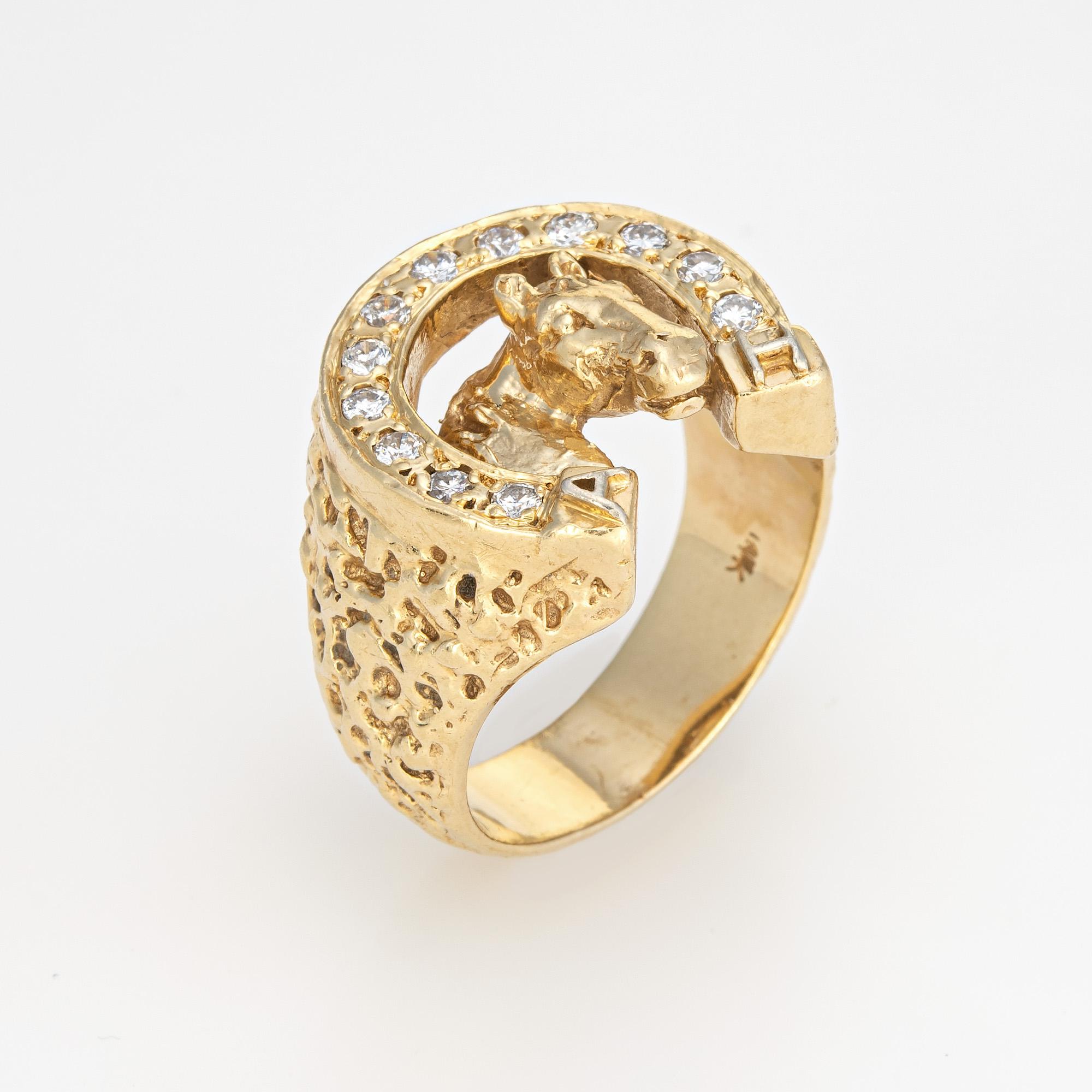 Stylish vintage diamond horseshoe ring (1970s) crafted in 14 karat yellow gold. 

12 diamonds total an estimated 0.24 carats (estimated at I-J color and SI1-I1 clarity). 

The charming horseshoe motif symbolizes good luck, with a horse head to the