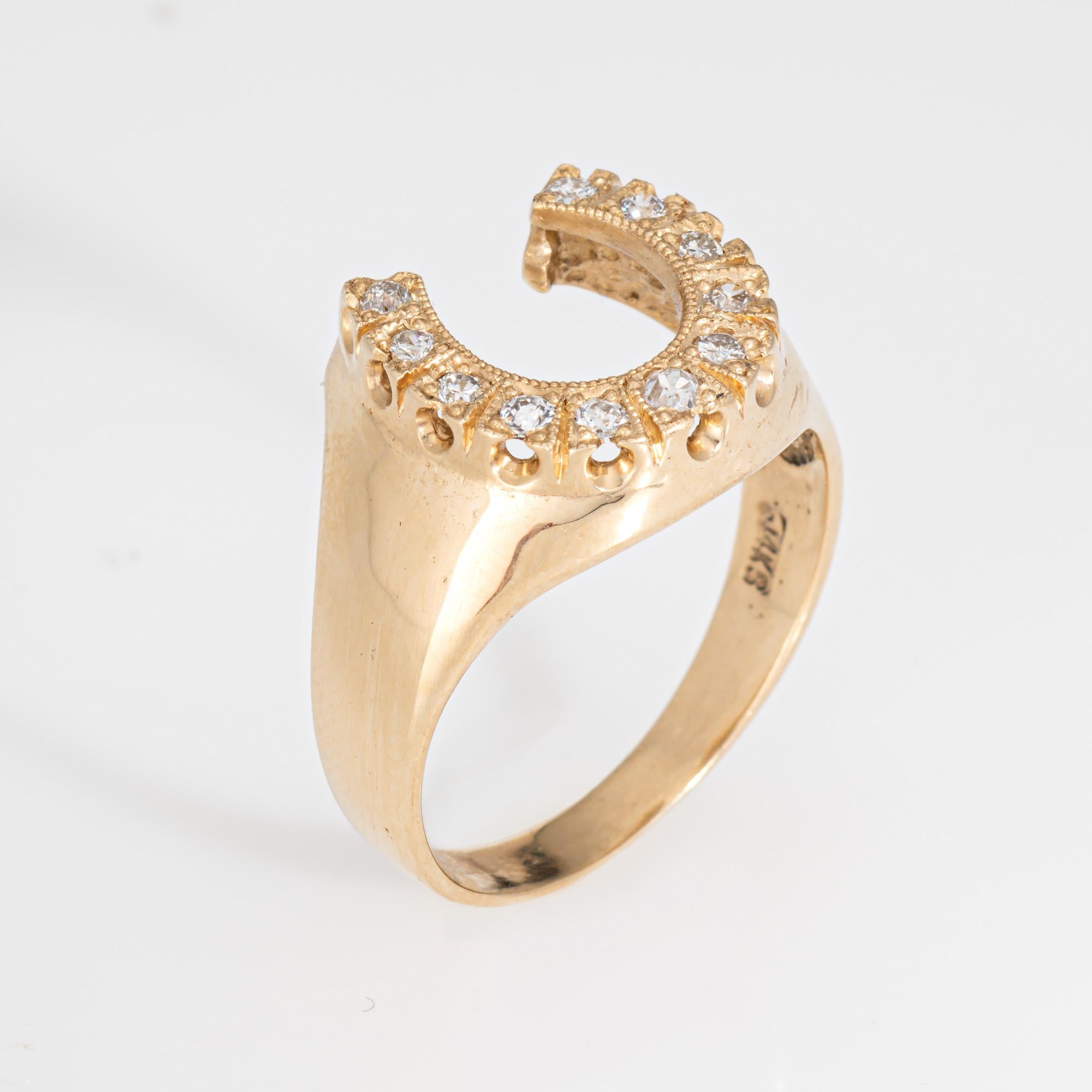 Stylish vintage diamond horseshoe ring (circa 1970s) crafted in 14 karat yellow gold. 

Diamonds total an estimated 0.25 carats (estimated at I-J color and SI1-I1 clarity).  

The lucky diamond horseshoe ring is great worn as a statement piece or