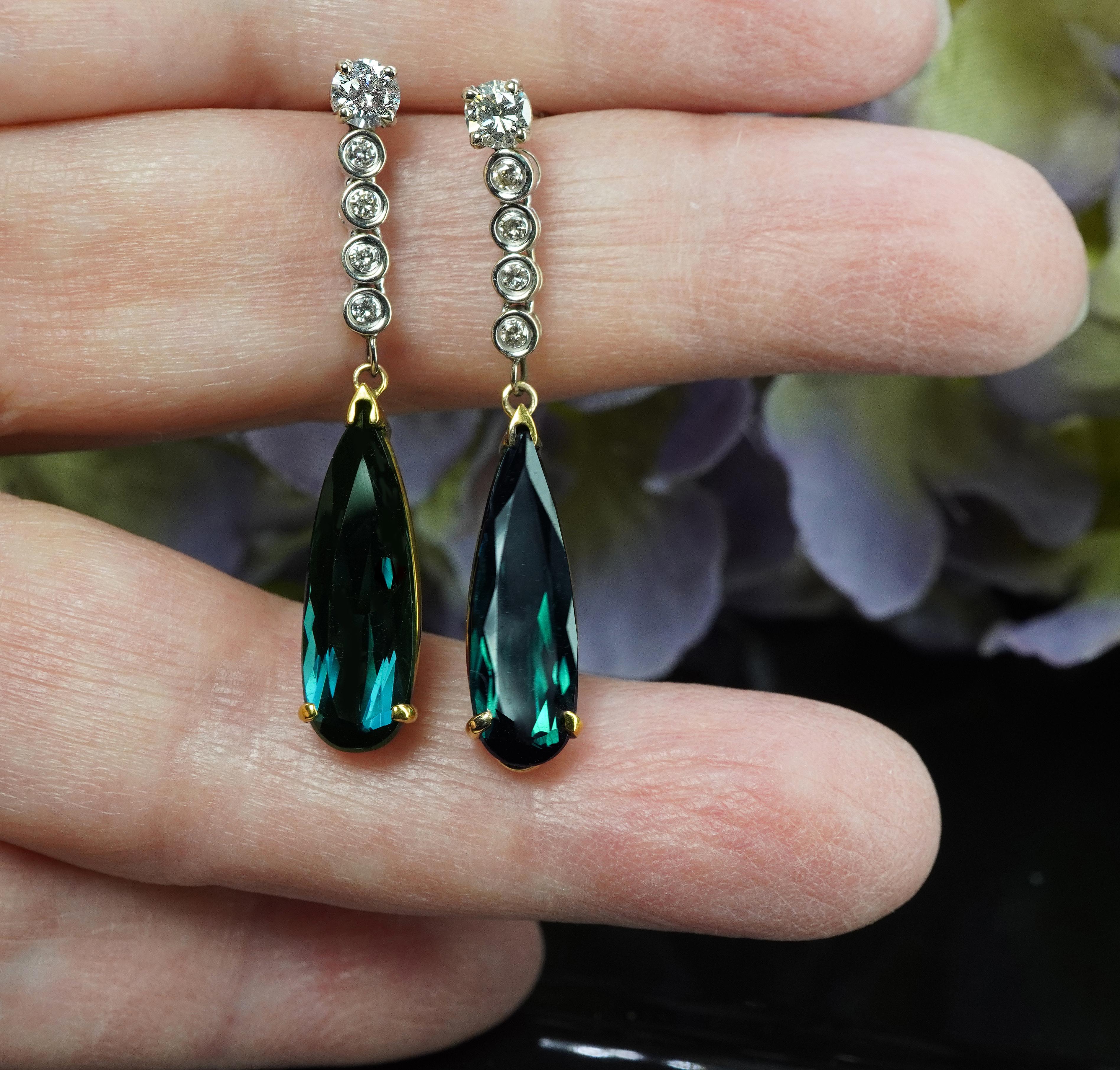   Vintage Diamond Indicolite Blue Tourmaline Earrings 14K Gold Long Dangling Estate 6ct

These terrific estate pair of earrings is crafted in luxurious 14K yellow and white gold (tested). They are just beautiful and set with fiery white diamonds and