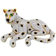 Retro Diamond Leopard Brooch 18 Karat White and Yellow Gold, Emerald and Onyx