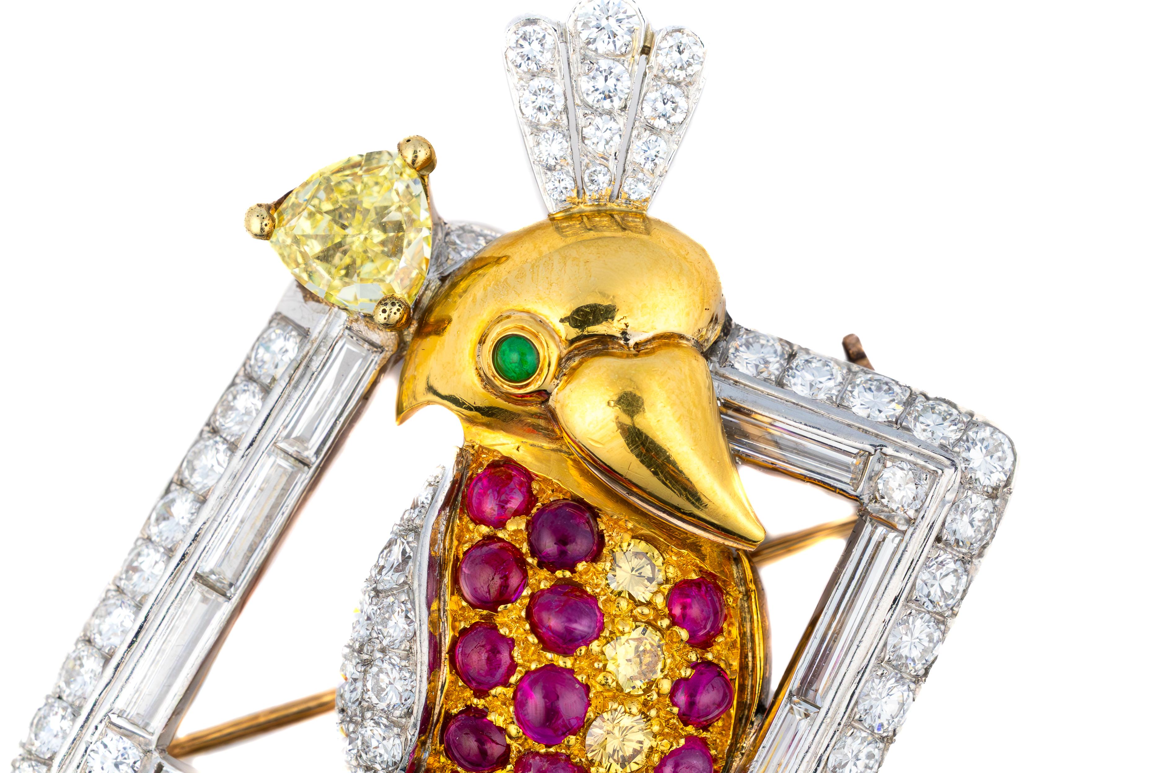 Broche vintage de diamantes y multigemas con forma de pájaro

Un broche de ave sorprendentemente artístico, exquisitamente elaborado en oro amarillo de 18 quilates y platino. El encantador pájaro está adornado con aproximadamente 2,28 quilates de