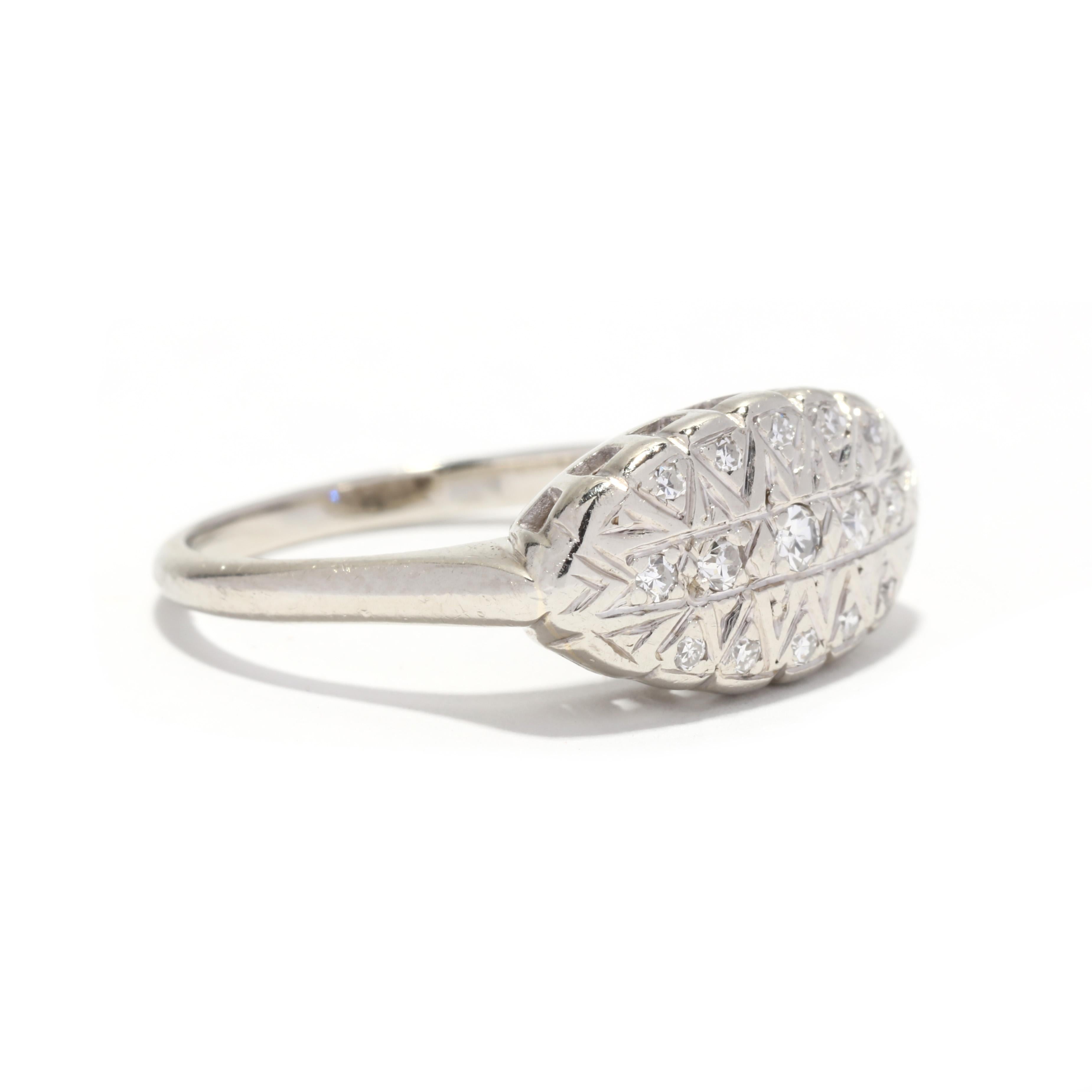 A vintage 14 karat white gold and diamond horizontal navette ring. This ring features a horizontal marquise motif set with single cut round diamonds weighing approximately .15 total carats and with triangular detailing.

Stones: 
- diamonds, 15