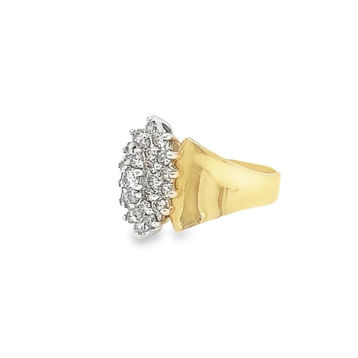 Glamorous, sophisticated, and completely unique, this ring makes a gorgeous statement. Vintage 14K yellow gold diamond cluster ring containing 29 round brilliant cut diamonds weighing approx. 2.58ctw. The diamonds are prong-set and curve upwards