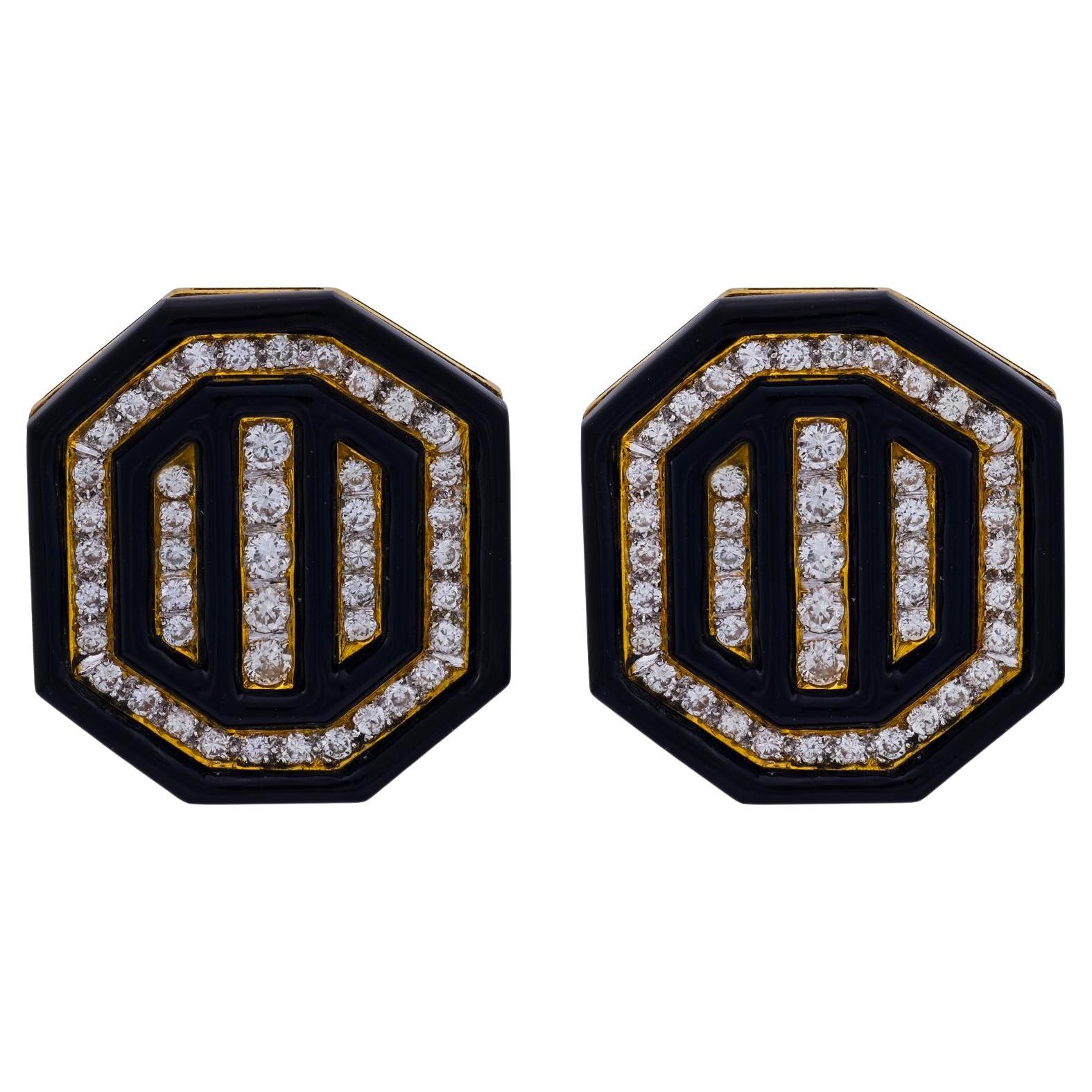 Orecchini a clip d
epoca in oro giallo 18 carati con diamante e onice