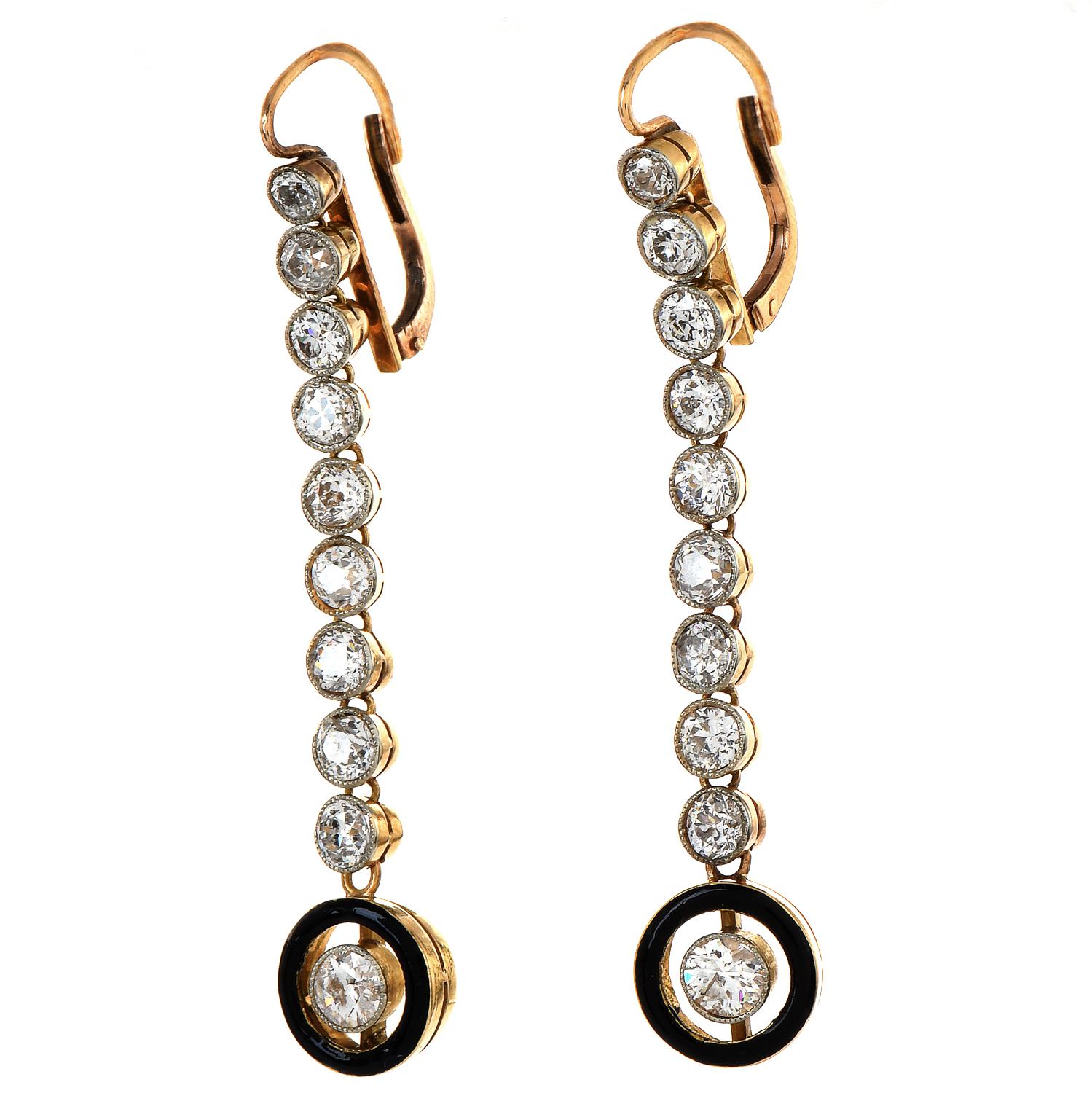  These fine elongated timeless earrings are elegant at every turn.

These vintage retro dangle drops  Black enamle  earrings are Crafted in 18K yellow gold. 

The center of each drop contains an old European cut diamond bezel set & is topped by (18)