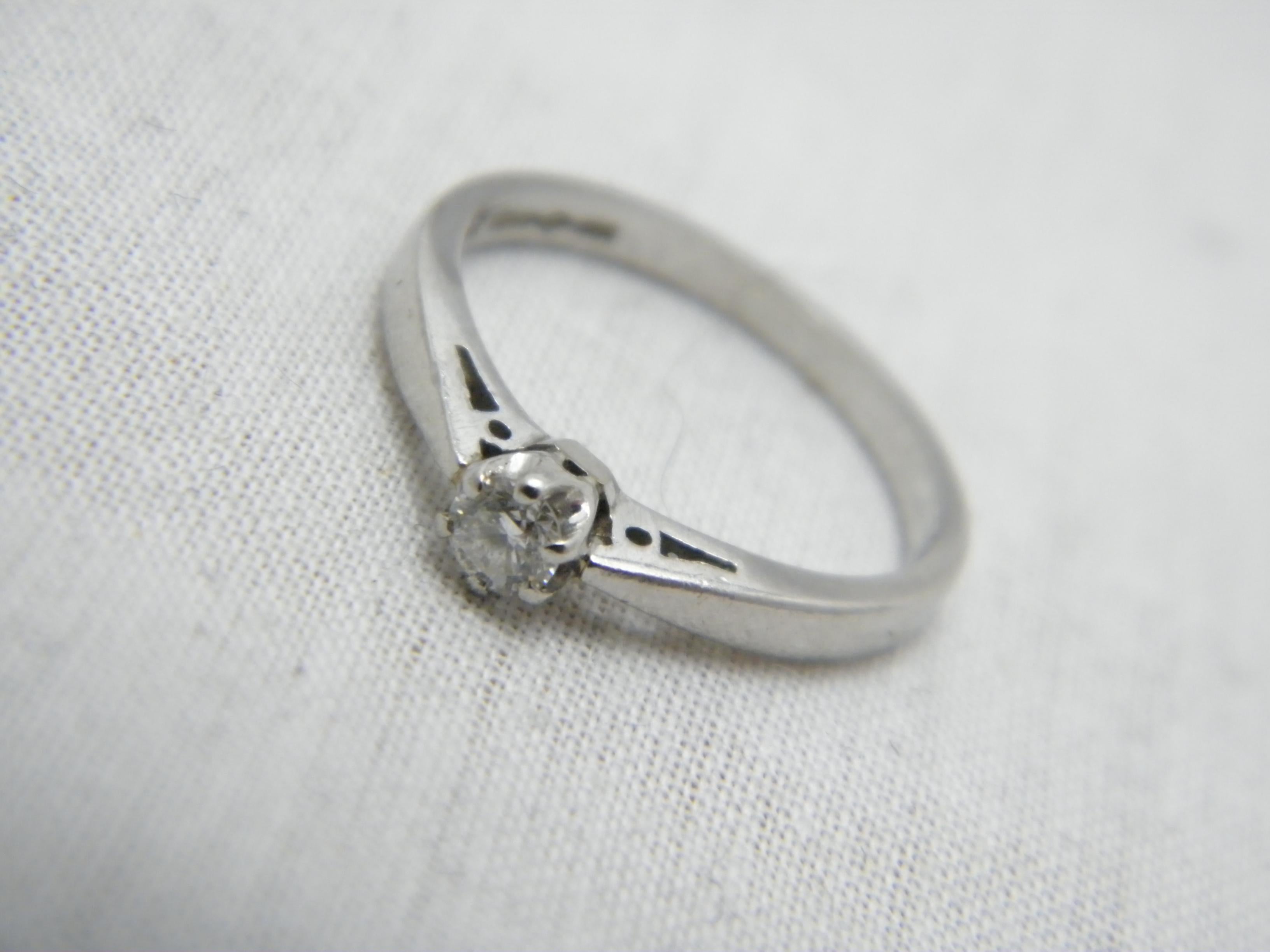 If you have landed on this page then you have an eye for beauty.

On offer is this gorgeous
950 PALLADIUM DIAMOND SOLITAIRE ENGAGEMENT BAND RING

DETAILS
Material: 950/1000 Palladium
Style: Classic single stone solitaire.
The ring has a very thick