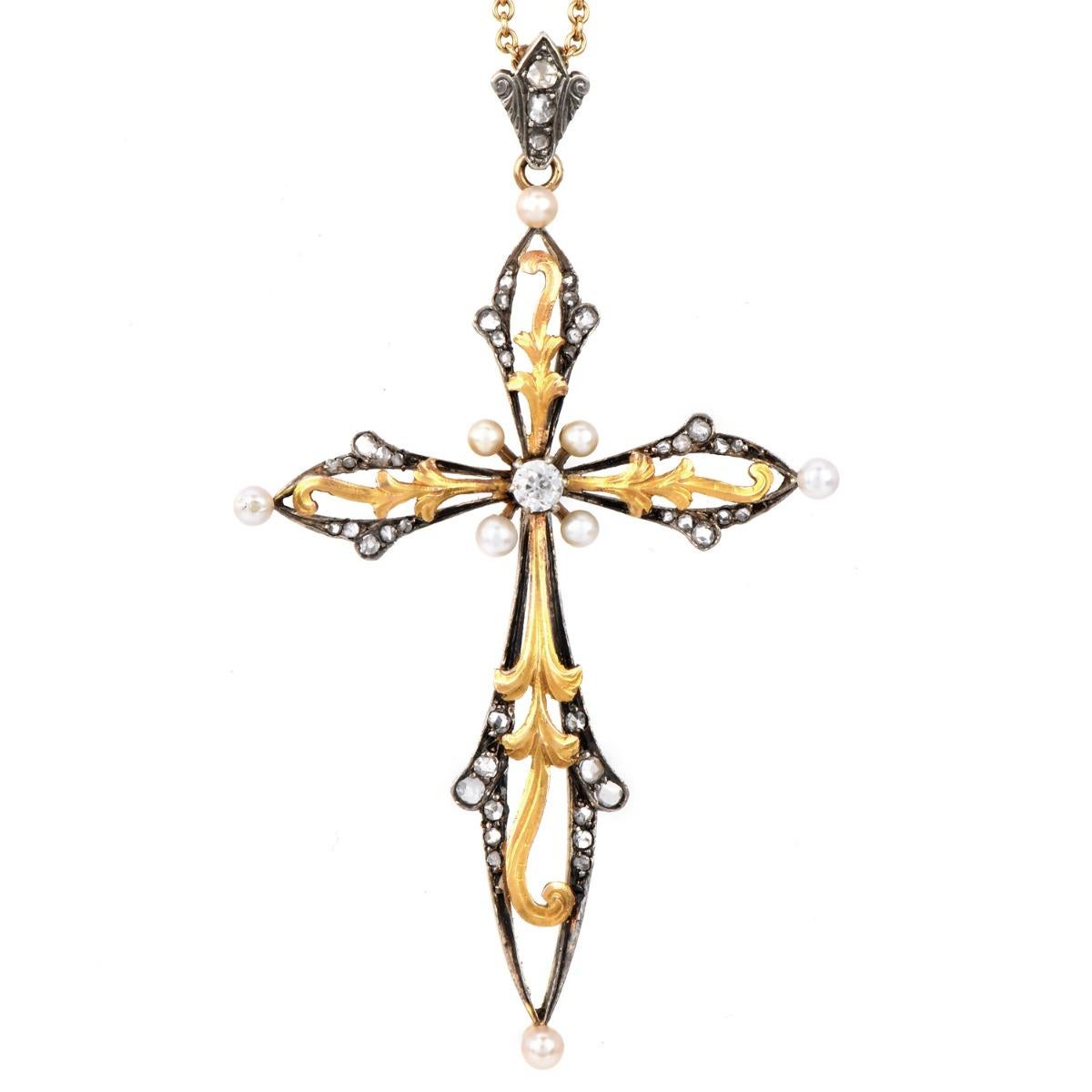 Ciondolo a croce in oro con diamanti e perle d'epoca

Questo bellissimo ciondolo a forma di croce religiosa vintage è realizzato in oro giallo 18 carati con parte superiore in argento e presenta un disegno a forma di fiore con una cornice in oro