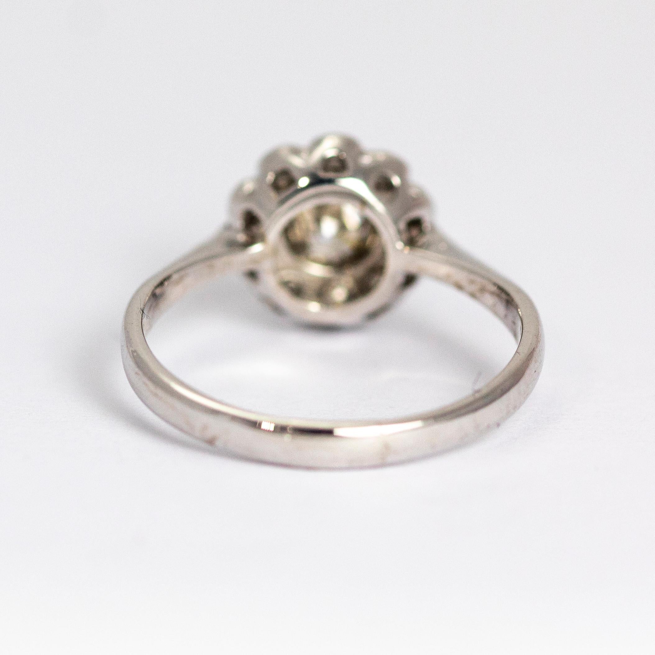 platinum cluster diamond engagement ring