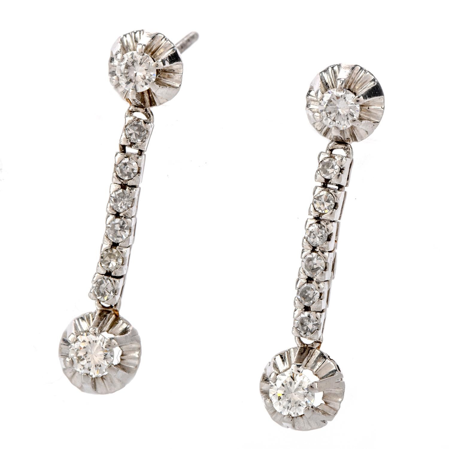 Reach for these classic Vintage Diamond Platinum Dangle Drop Line Earrings each time you attend your VIP event.  These simple yet stunning dangle earrings are crafted in luxurious platinum and have 16 gleaming genuine diamonds of 0.70 carats, G-H