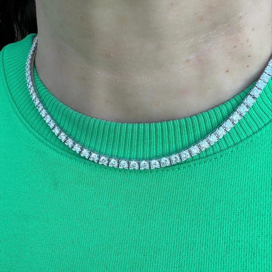 Circa 1930-40's, by noted jewelry firm M. Waslikoff & Sons, this special platinum diamond choker is a rare find! The tapering design is set with 95 transitional round cut diamonds, exceptionally well matched averaging G-H color/VS-SI clarity,