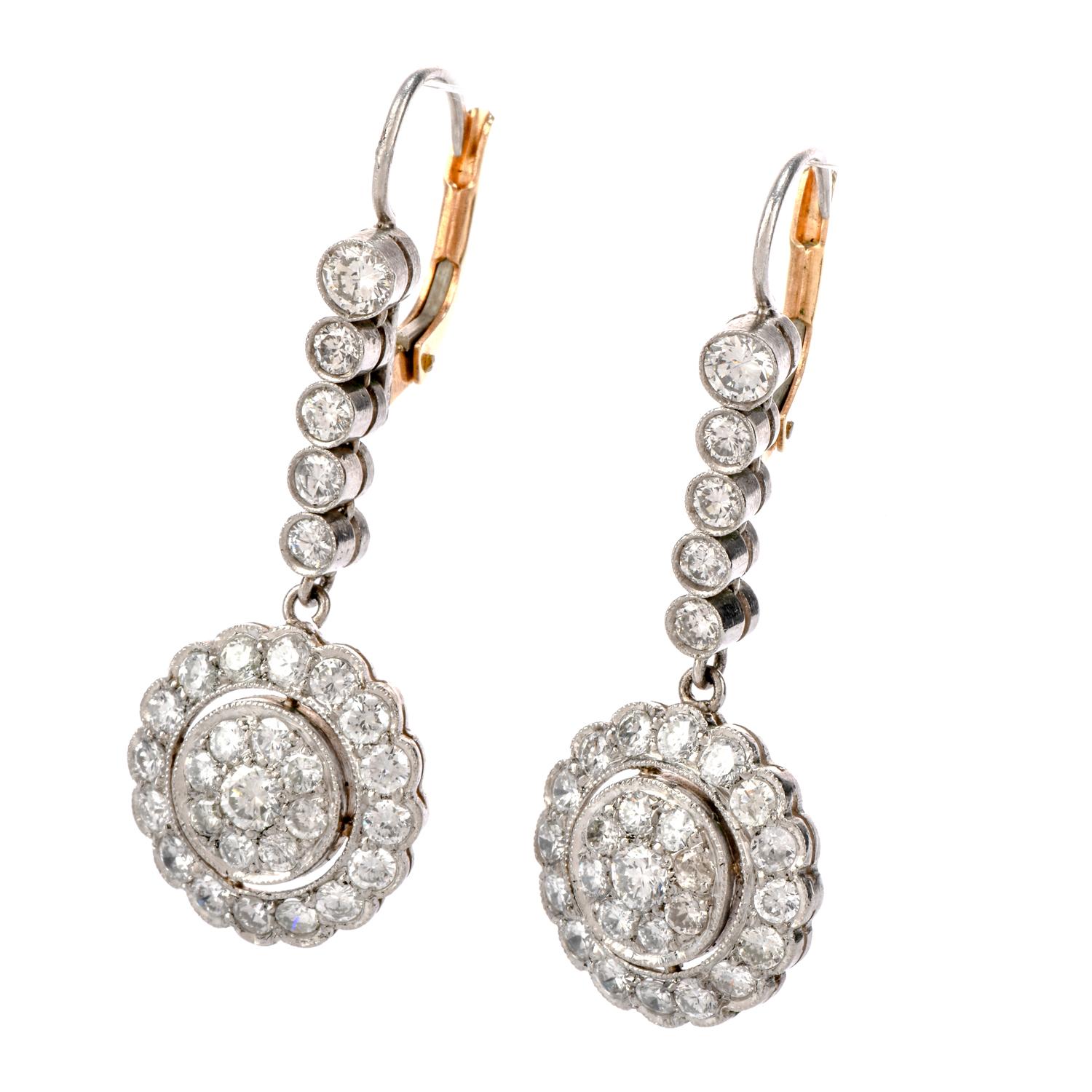 Place some vintage sparkle on your ears while in your little black dress, with these Vintage Diamond Platinum Round Cluster Dangle Drop Earrings!  These darling earrings are crafted in platinum with 70 bezel set, genuine diamonds of 2.75 carats, H-I