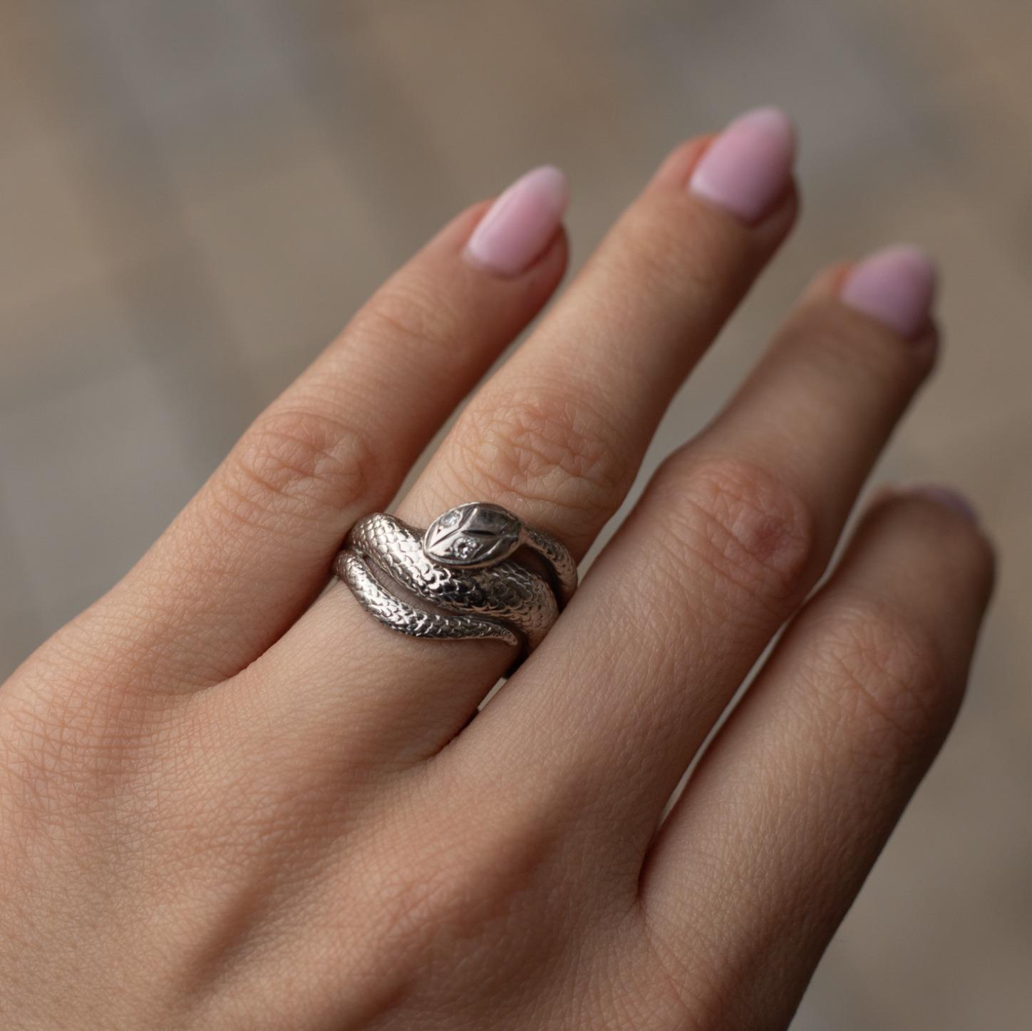 Oval Cut Vintage Diamond Platinum Snake Ring, Circa 1970 For Sale