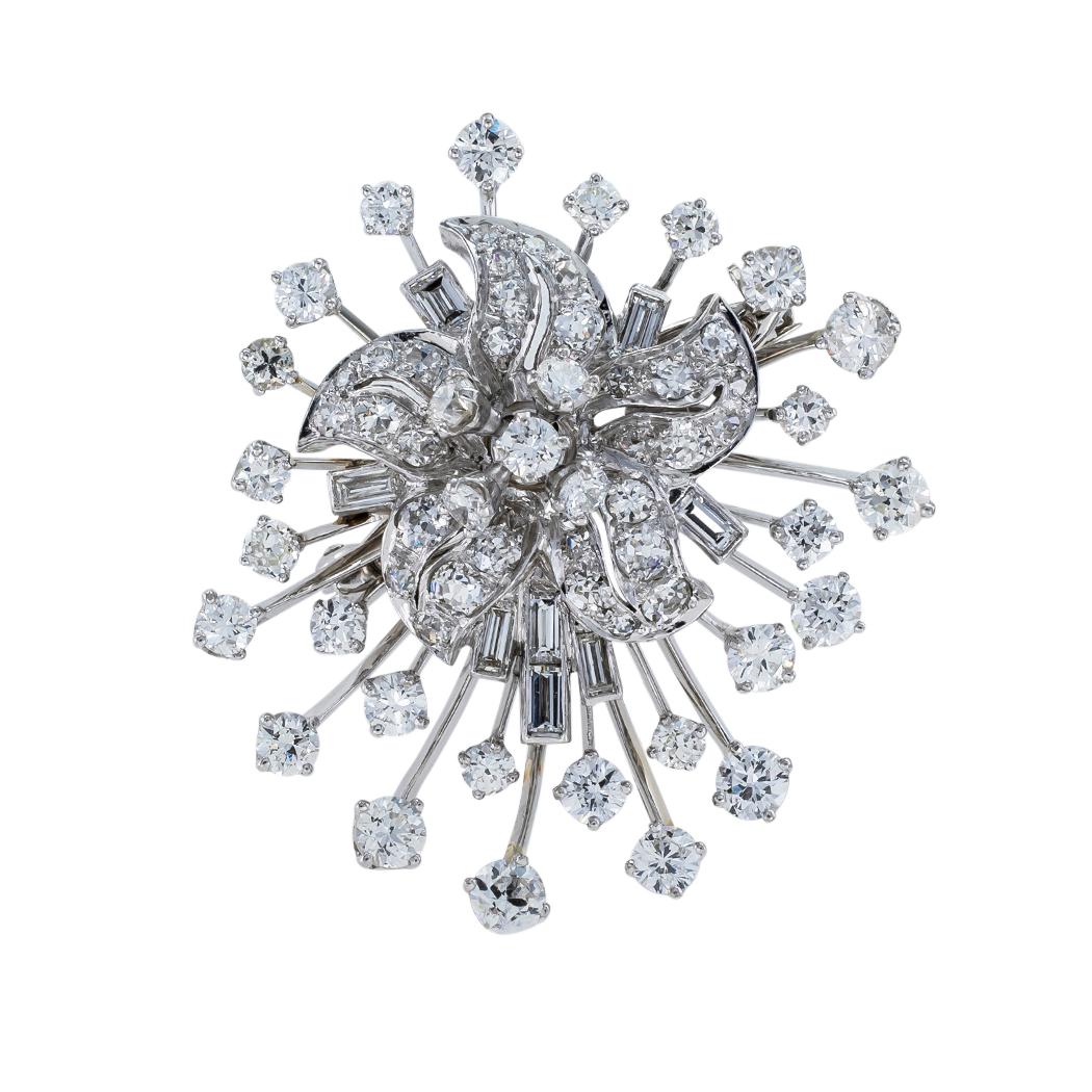 Vintage diamond and platinum spray brooch pendant circa 1950s. *

The facts you want to know are listed below.  Read on.  It is remarkably short, simple, and clear.  Do contact us right away if you have additional questions. 

SPECIFICATIONS:

*The
