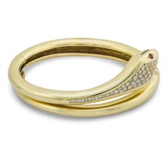 Vintage diamond ruby 14k yellow gold snake bangle Vintage diamond ruby 14k yellow gold snake bangle