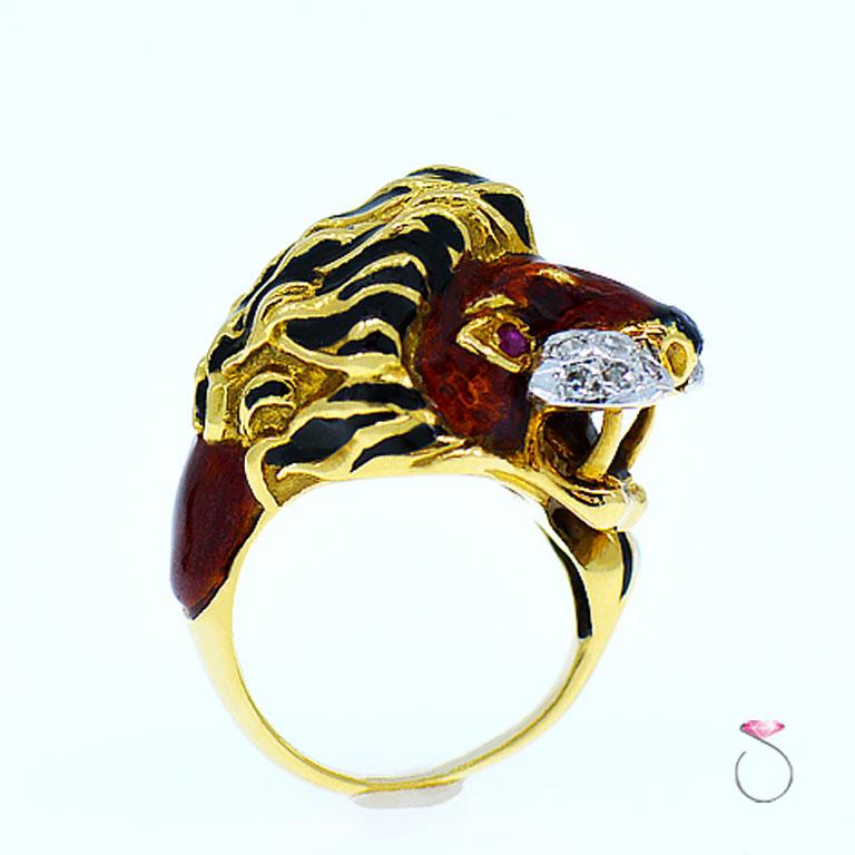 Rare Vintage enamel large Lion ring from the 1960's. This gorgeous figural ring features a beautifully enameled Lion in vibrant reddish Brown & Black enamel, the Lion's tail loops around the finger and settles next to the head.  The Lion has Ruby