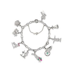 Vintage Diamond, Ruby, and Emerald Platinum Holiday Charm Bracelet