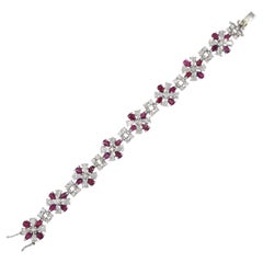 Vintage diamond & ruby bracelet in platinum.