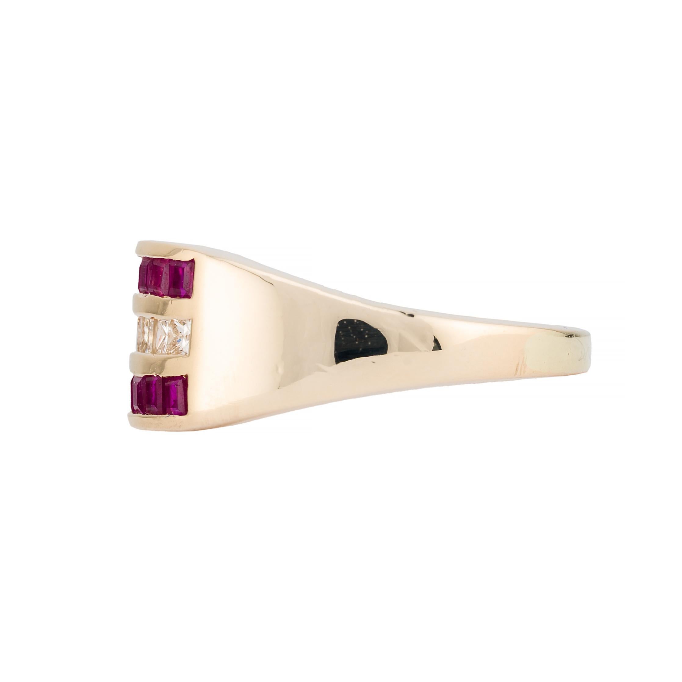 Aston Estate Jewelry Presents:

A striking band ring featuring 0.28 carats of princess cut diamonds, graded H color and VS2 clarity. The diamonds are elegantly set between vibrant square cut rubies totaling 0.70 carats.

Crafted in 14k yellow gold,