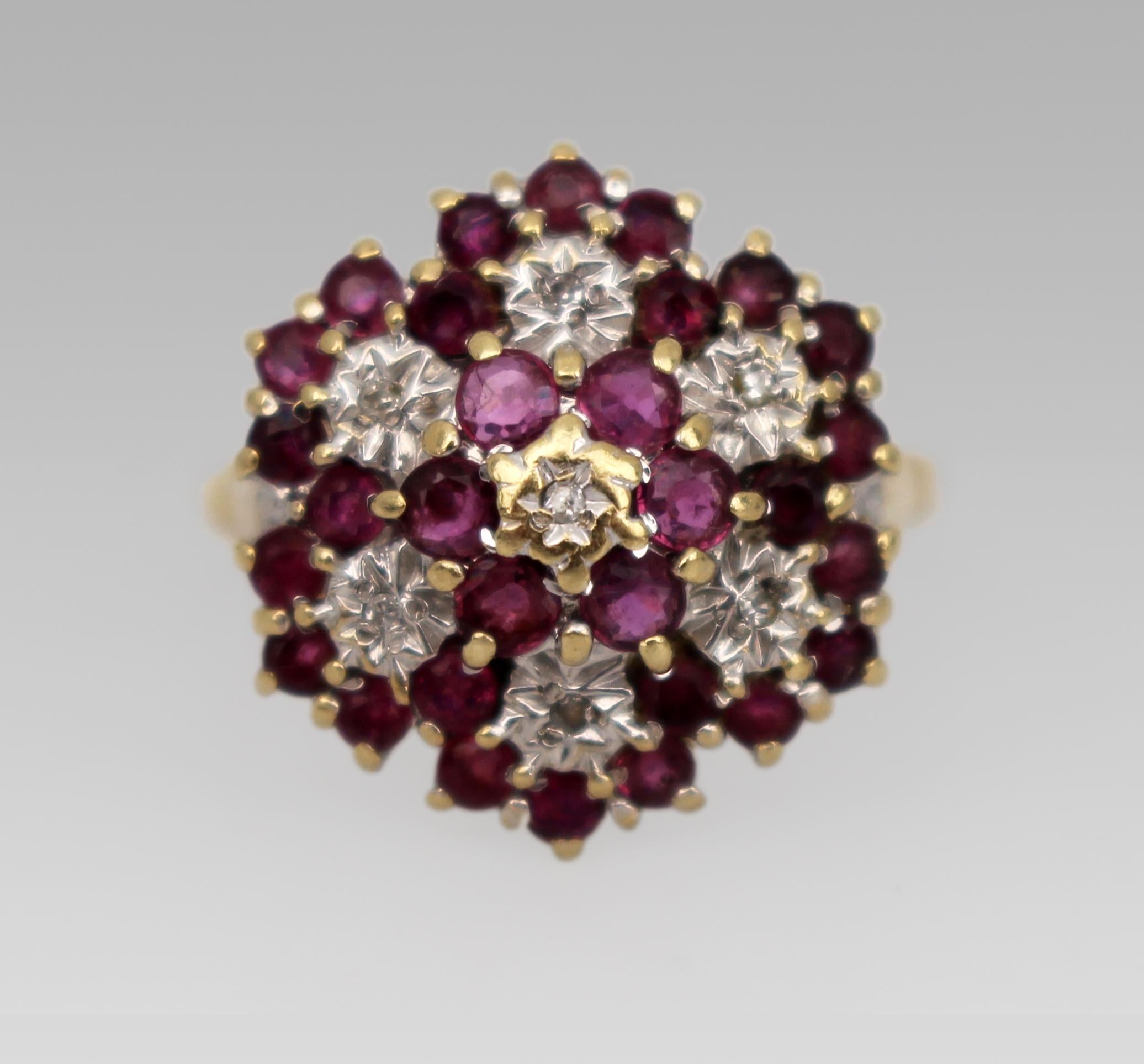 Vintage Diamond & Ruby Cluster Ring in 9ct Gold

This vintage cluster ring is crafted in solid 9ct gold and features a striking arrangement of thirty-six stones. Six diamonds are set among thirty rubies in a traditional cluster design, creating a