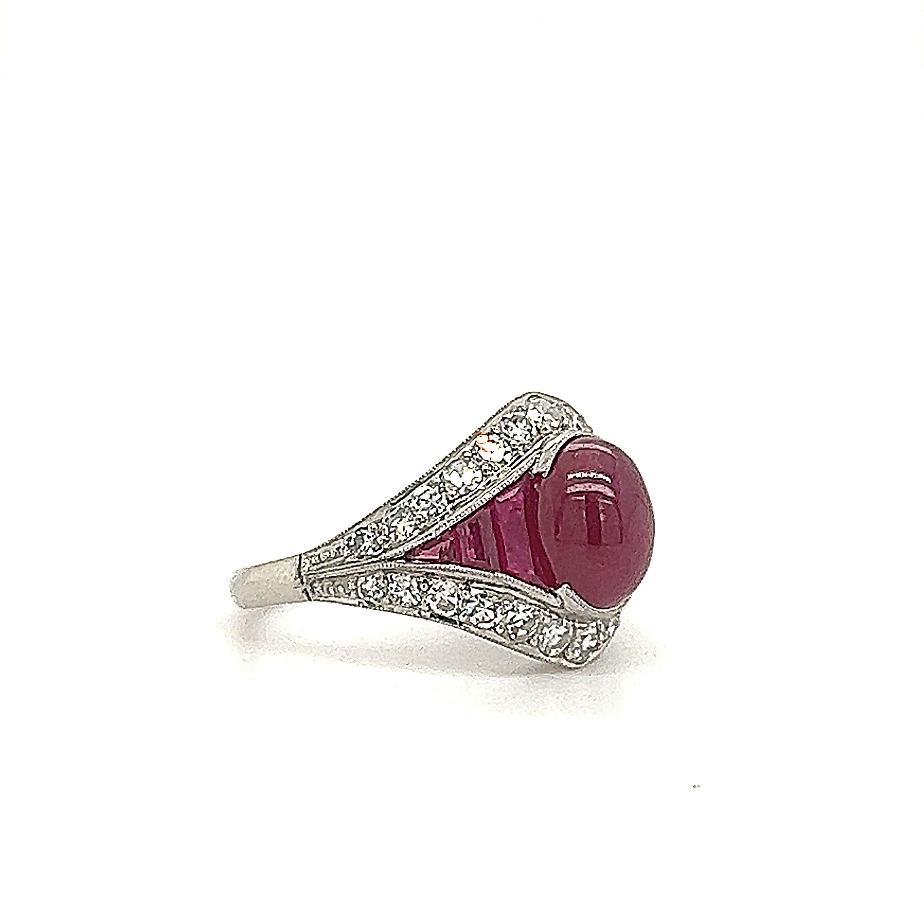 Wonderful creation crafted in 18k white gold. Styled after the art deco time period this ring is truly breathtaking and a real show stopper. The ring shows a unique design as diamond and ruby gemstones are set perfectly making this ring a true work
