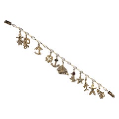 Vintage Diamond Ruby Sapphire Emerald Charm Bracelet Yellow Gold 1980s