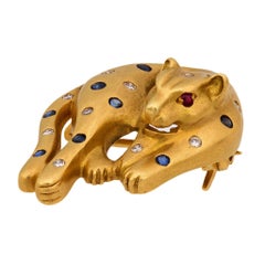 Vintage diamond sapphire 18k yellow gold panther brooch
