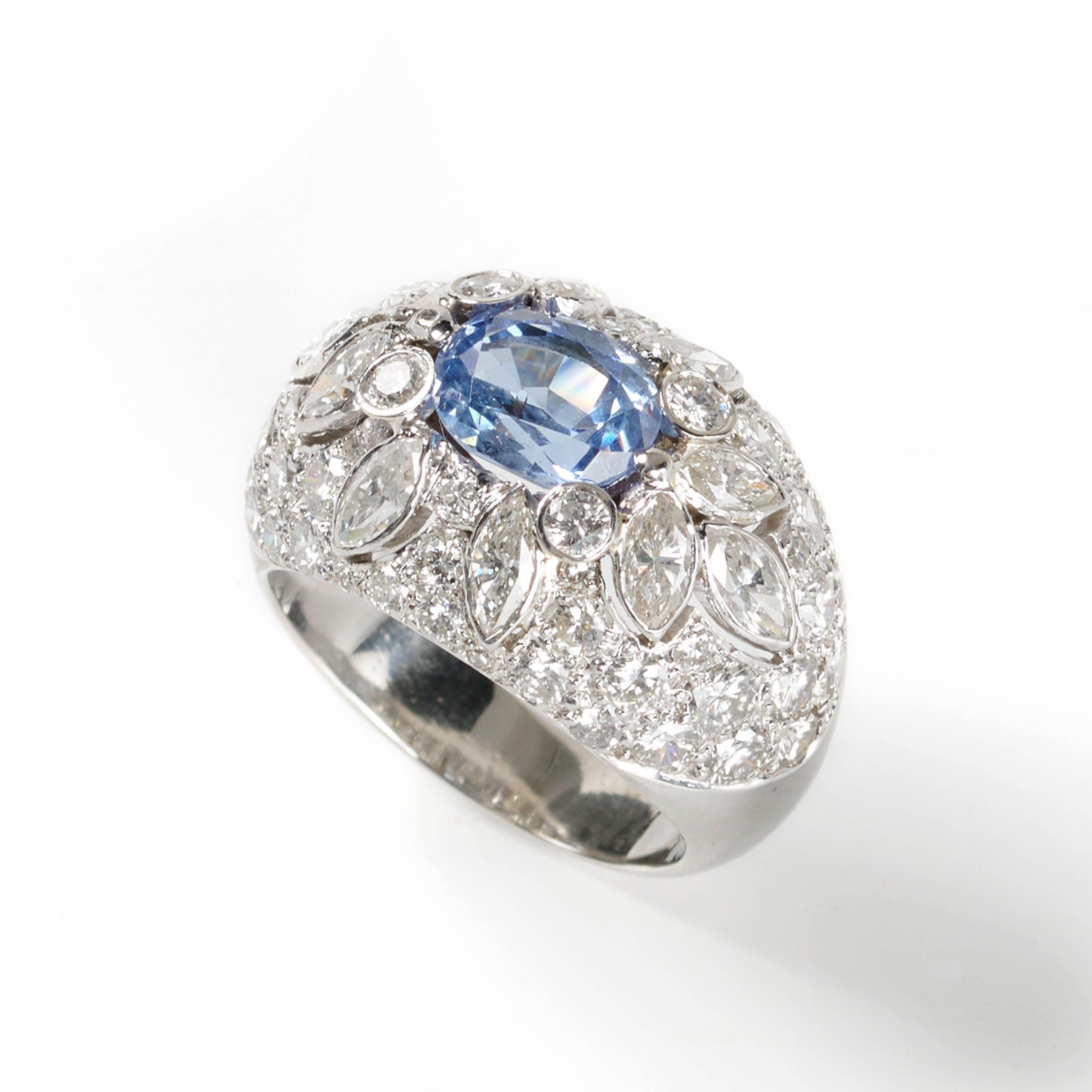 Women's Vintage Diamond, Sapphire And Platinum Bombé Ring, Circa 1960 For Sale