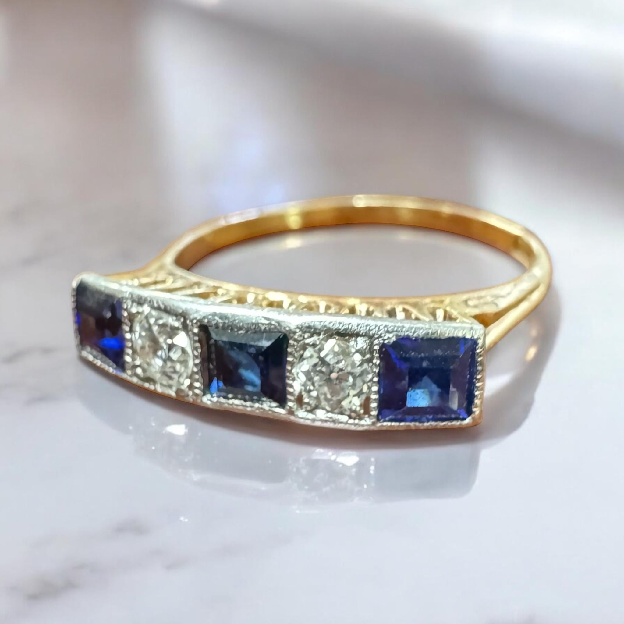 Wed always love the combination of diamonds & sapphires!!

Ring Details
Material: 14K Yellow & White Gold
Era: Art Deco 1920 - 1940
Head Width: 4.2mm
Head Height: 4.1mm
Shank Width: 1.4mm
Weight: 2.3 Grams
Finger Size: 6 1/4
Sizable Upon