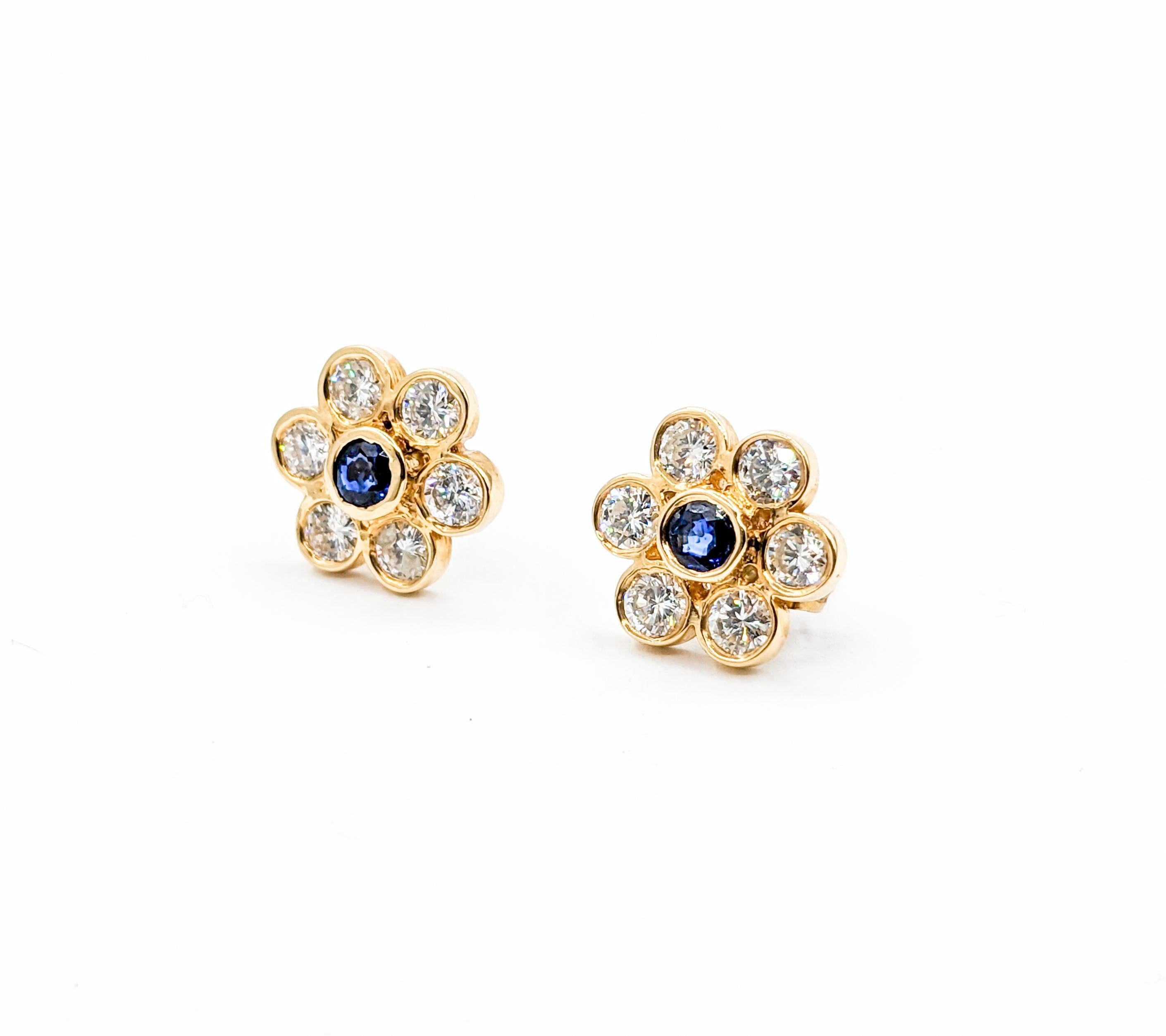 Vintage Diamond & Sapphire Floral Stud Earrings

Illuminate any ensemble with these radiant flower shaped diamond and sapphire earrings. Expertly crafted in 14k yellow gold, they showcase .42ctw of round-cut sapphires in a deep blue hue. The center