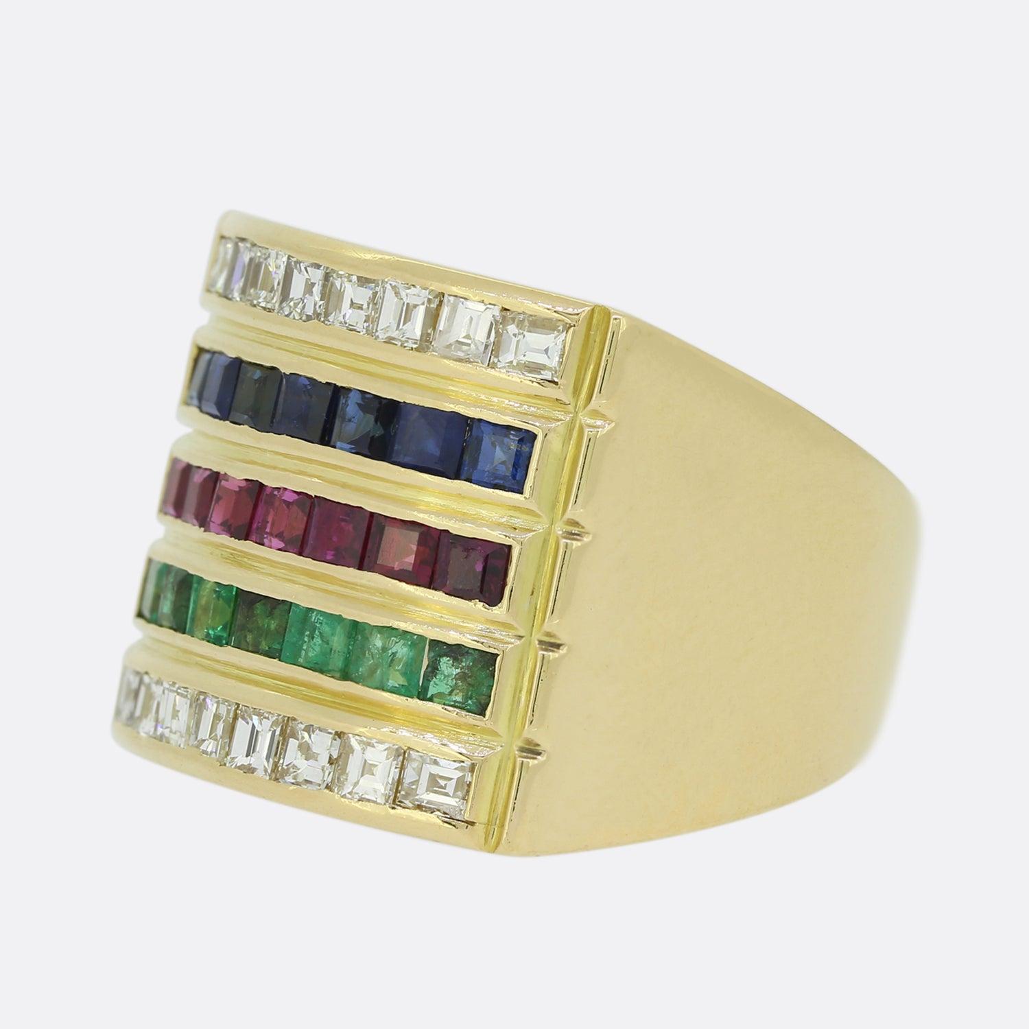 This is a vintage 18ct yellow gold multi gemstone ring. The gemstones consist of carre cut diamonds, sapphires, rubies and emeralds. They are set over five rows and it is a fun and colourful look, fitting comfortably on the finger. All of the