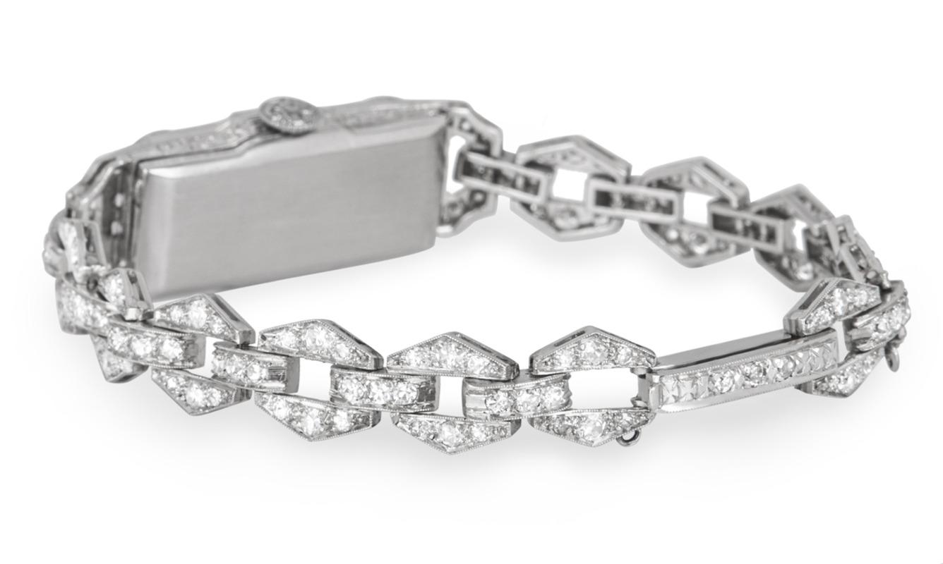 Montre-bracelet cocktail vintage à cadran argenté et platine serti de diamants en vente 1