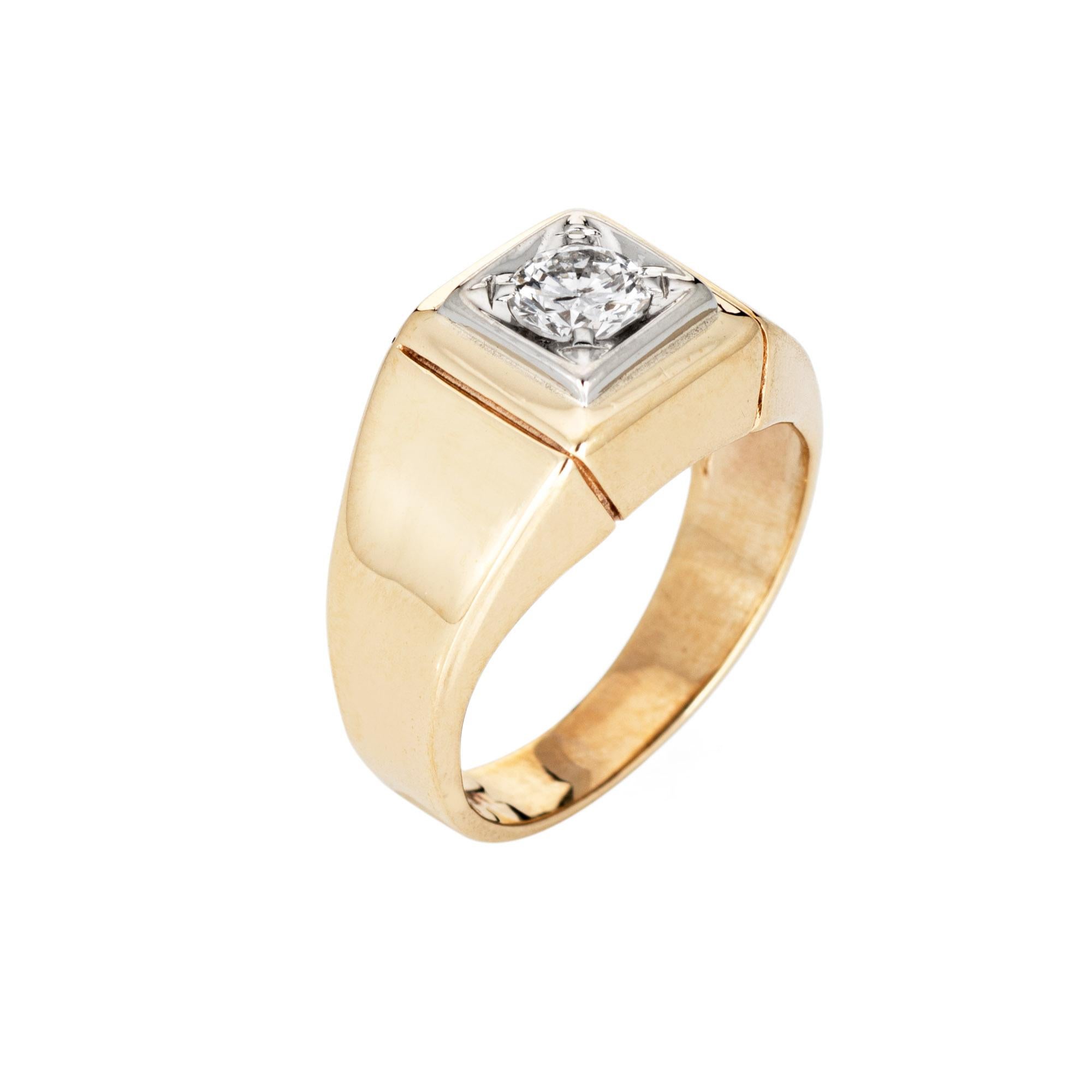 Stylish vintage diamond signet ring (circa 1970s to 1980s) crafted in 10 karat yellow gold. 

Round brilliant cut diamond is estimated at 0.25 carats (estimated at J-K color and SI2 clarity). 

The square signet ring is set with an estimated 1/4