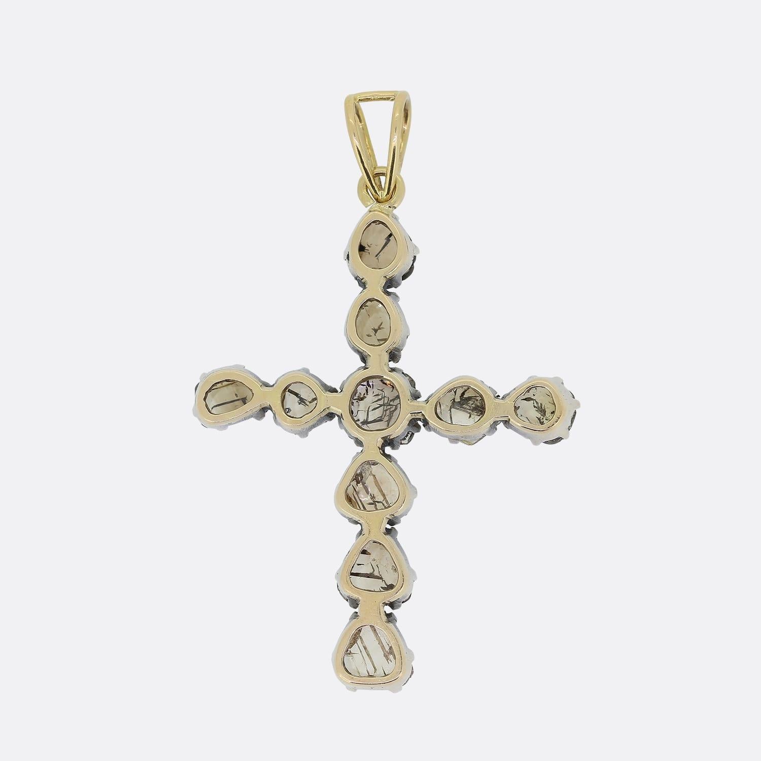 This is a 14ct yellow gold silver set diamond slice cross pendant. Ten individual diamond slices have been used to form one beautiful and unique pendant.

Condition: Used (Very Good)
Weight: 7.6 grams
Pendant Dimensions: 47mm x 37mm x 4.5mm
Diamond