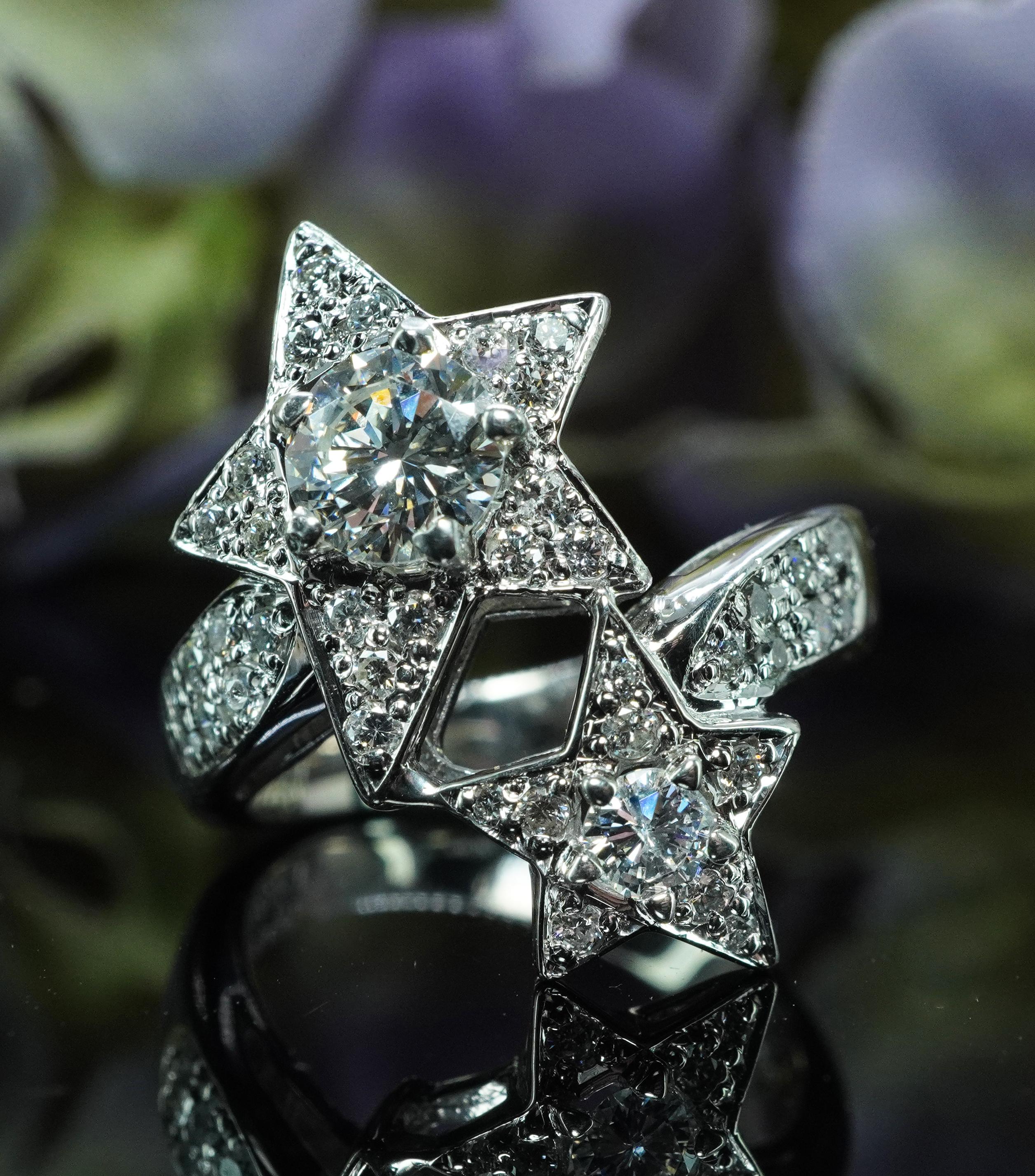  Vintage Diamond Star Ring Platinum .54ct center Estate Jewelry 1.21cttw

This is a gorgeous vintage platinum and diamond ring. Total diamond weight is estimated to be 1.21 carats. The center stone is .54 carat, we had it out of the mounting, so it