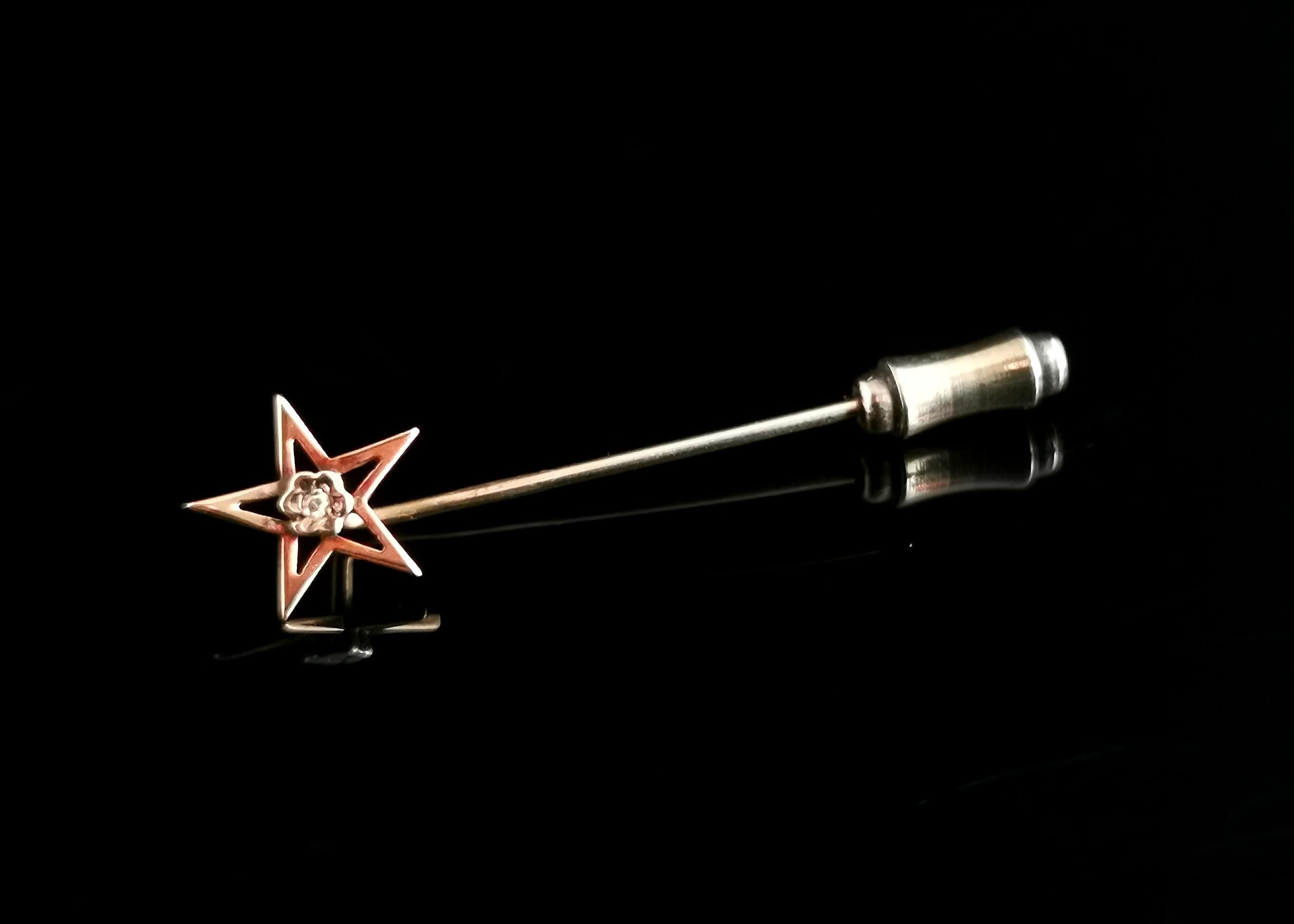 An attractive vintage 9ct gold and diamond stick pin.

A 9ct yellow gold stick pin with a star shaped terminal set with a single diamond chip.

The stick pin also known as a tie or cravat pin started out its journey in the early 19th century as a