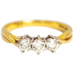 Anello vintage con tre pietre di diamante in oro 18 carati