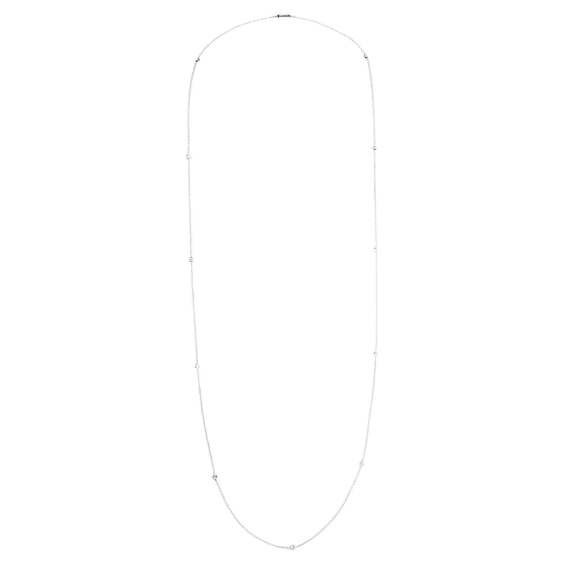 Add a touch of elegance to your everyday look with this exquisite 'Diamonds by the Yard' vintage necklace.

Expertly crafted in 18 carat white gold, this stunning station necklace features 11 fine quality round brilliant cut diamonds with an