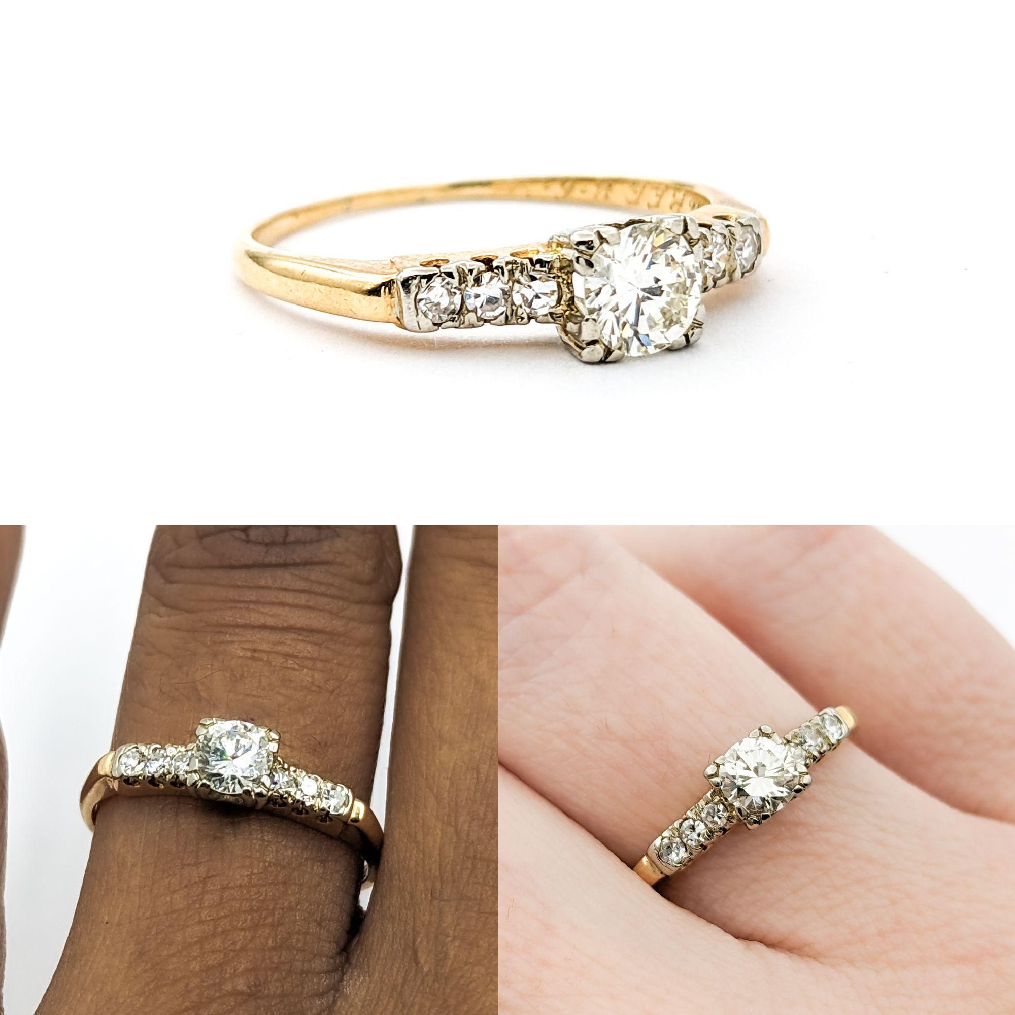 Vintage Diamonds Ring In Yellow Gold

This exquisite Vintage Ring is masterfully crafted in 14kt Yellow Gold and showcases a .33ct round diamond with sparkling SI1 clarity and H-I color. Complemented by an additional .15ctw of diamonds, this ring