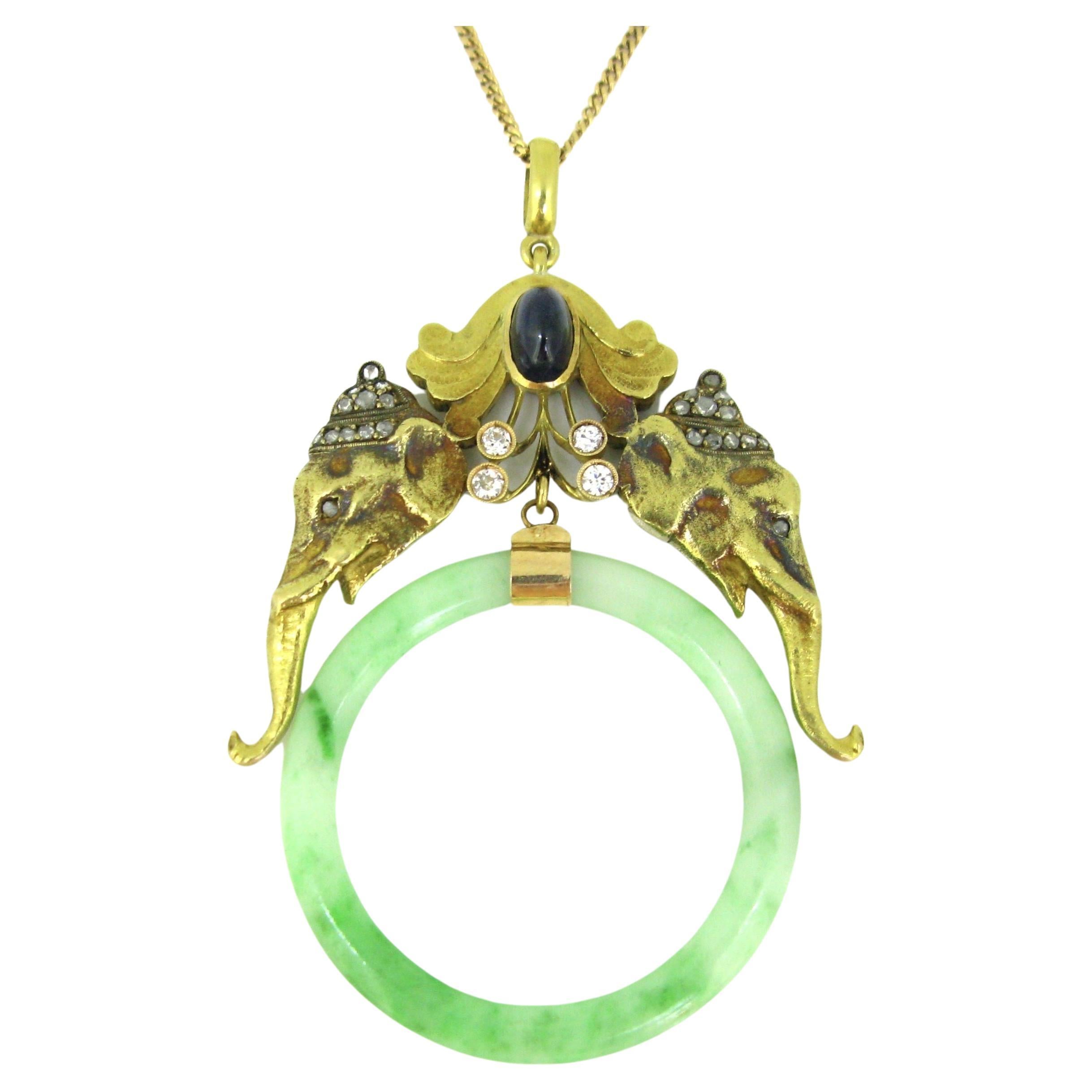 Vintage Diamonds, Sapphire, Jade Elephants Pendant, 18kt Yellow Gold, circa 1950 For Sale