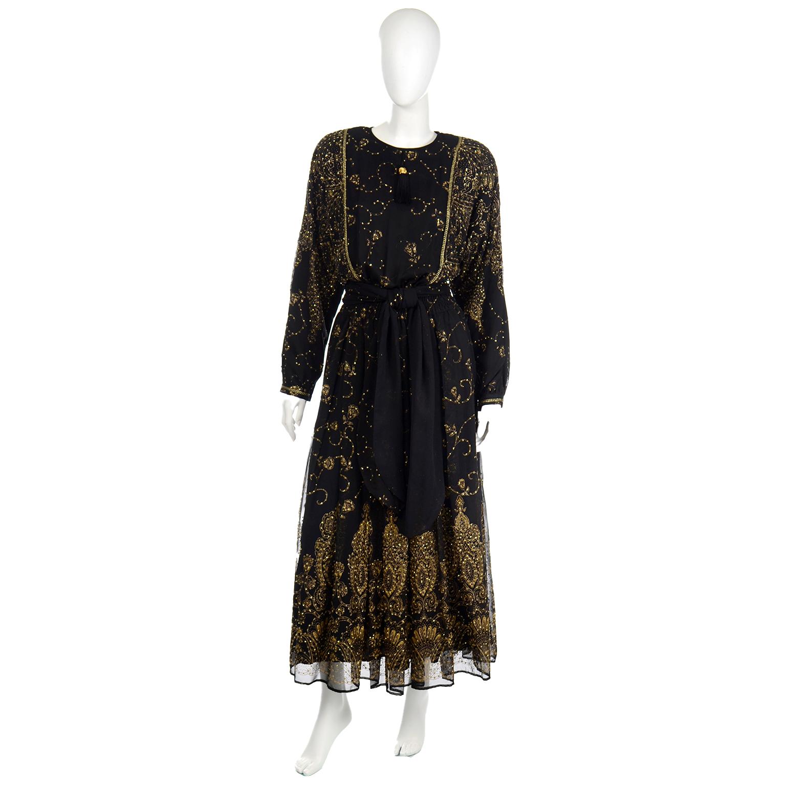 This is a stunning, very unique Diane Freis Original sheer black and gold shiny evening gown with a matching sash style scarf. We acquired this evening dress from a woman who had the most unusual Diane Freis dresses we've ever seen!  The dress has